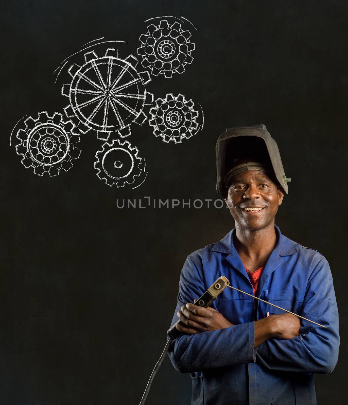 African American black man industrial worker with chalk gears on a blackboard background