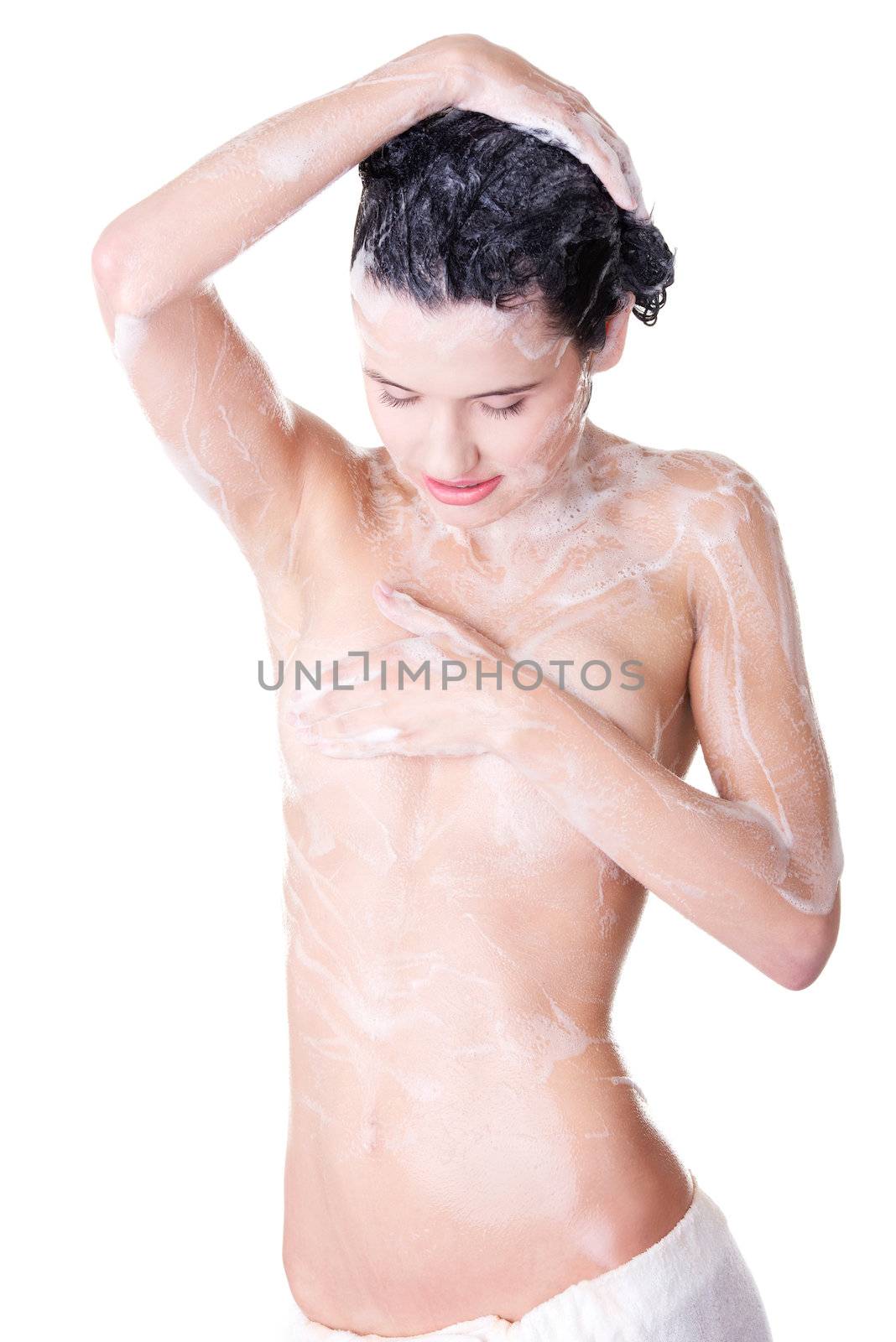 Young woman in shower washing her body by BDS