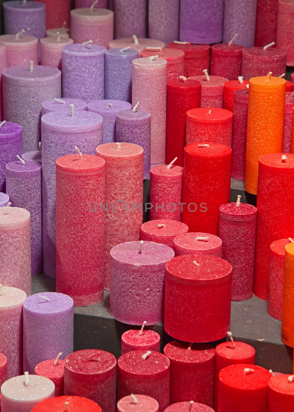 Colorful Christmas candles on the sale