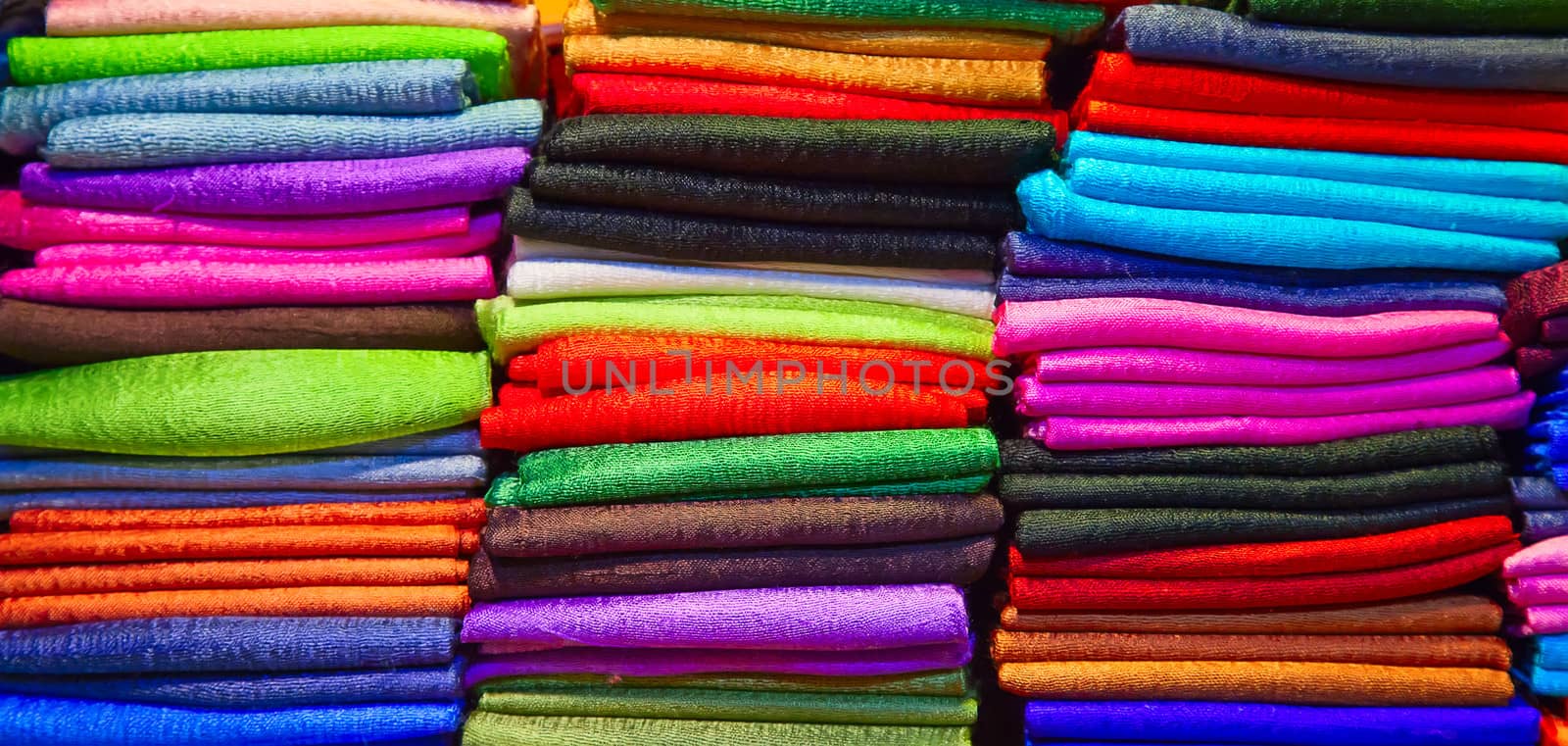 Colorful samples of the thai silk in the shop