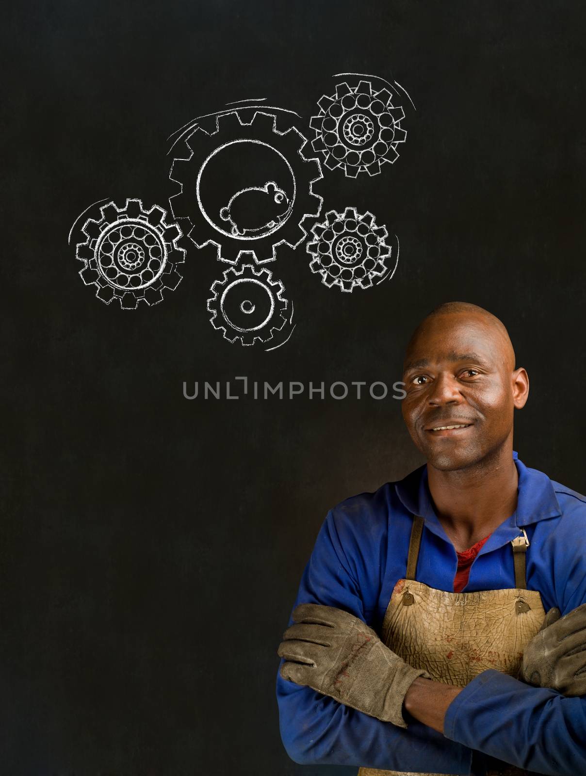 African American black man industrial worker with chalk hamster gears on a blackboard background