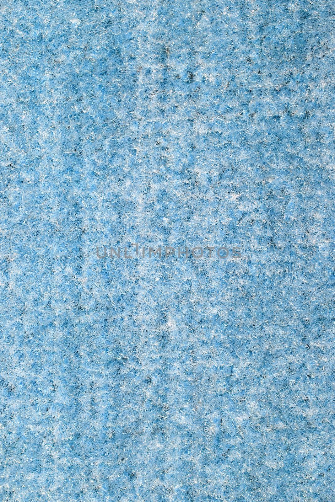 Background of blue carpet or foot scraper