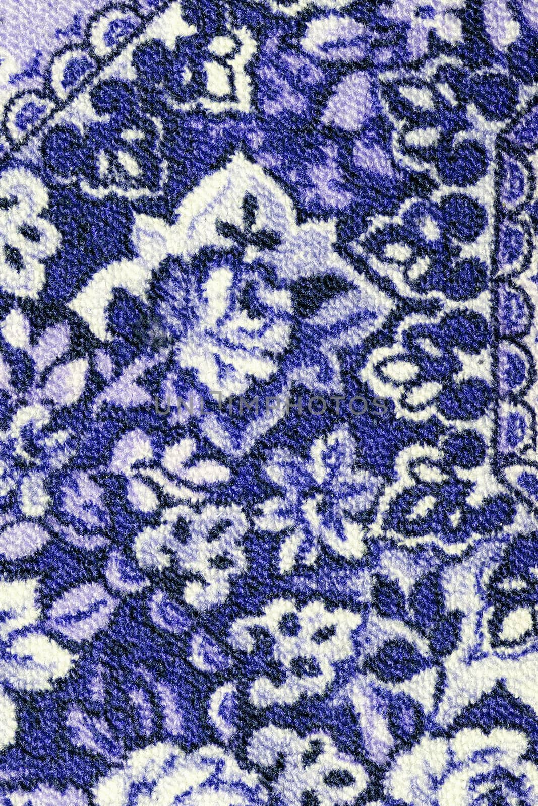 Fragment of colorful retro tapestry textile pattern with floral ornament useful as background by sfinks