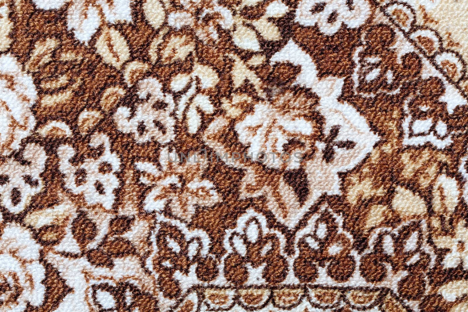 Fragment of colorful retro tapestry textile pattern with floral ornament useful as background