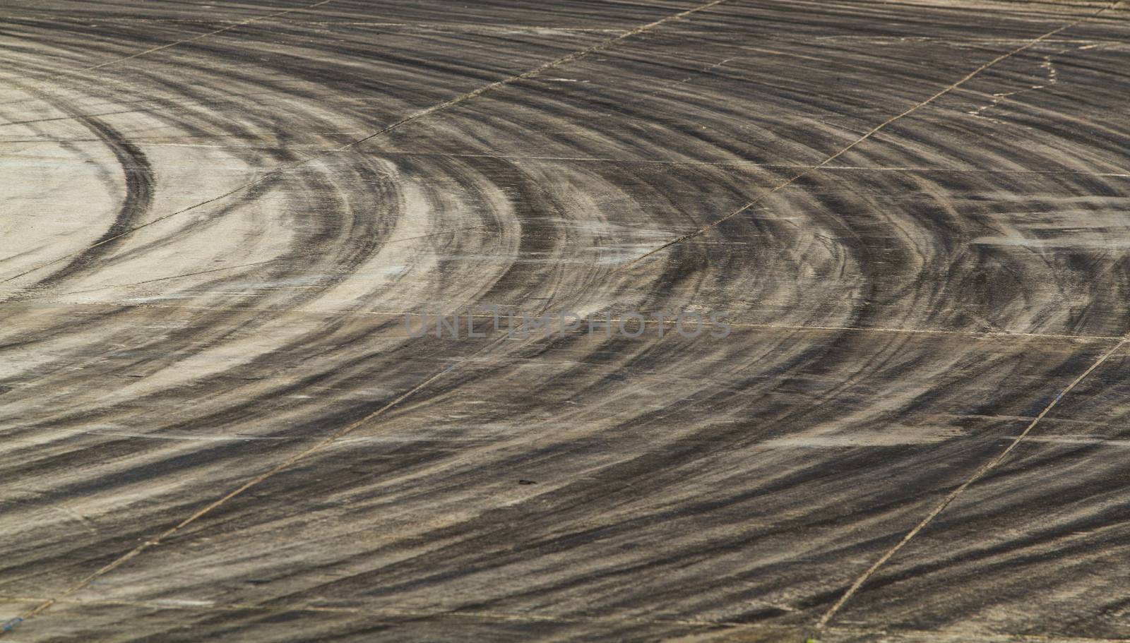 Background with tire marks on road track