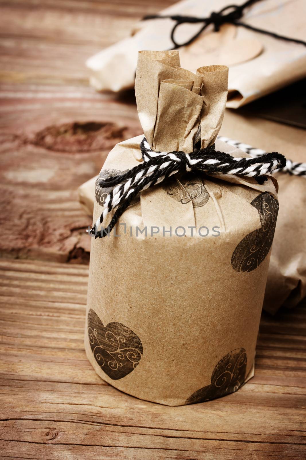 Holiday presents wraped in a rustic earthy style by melpomene