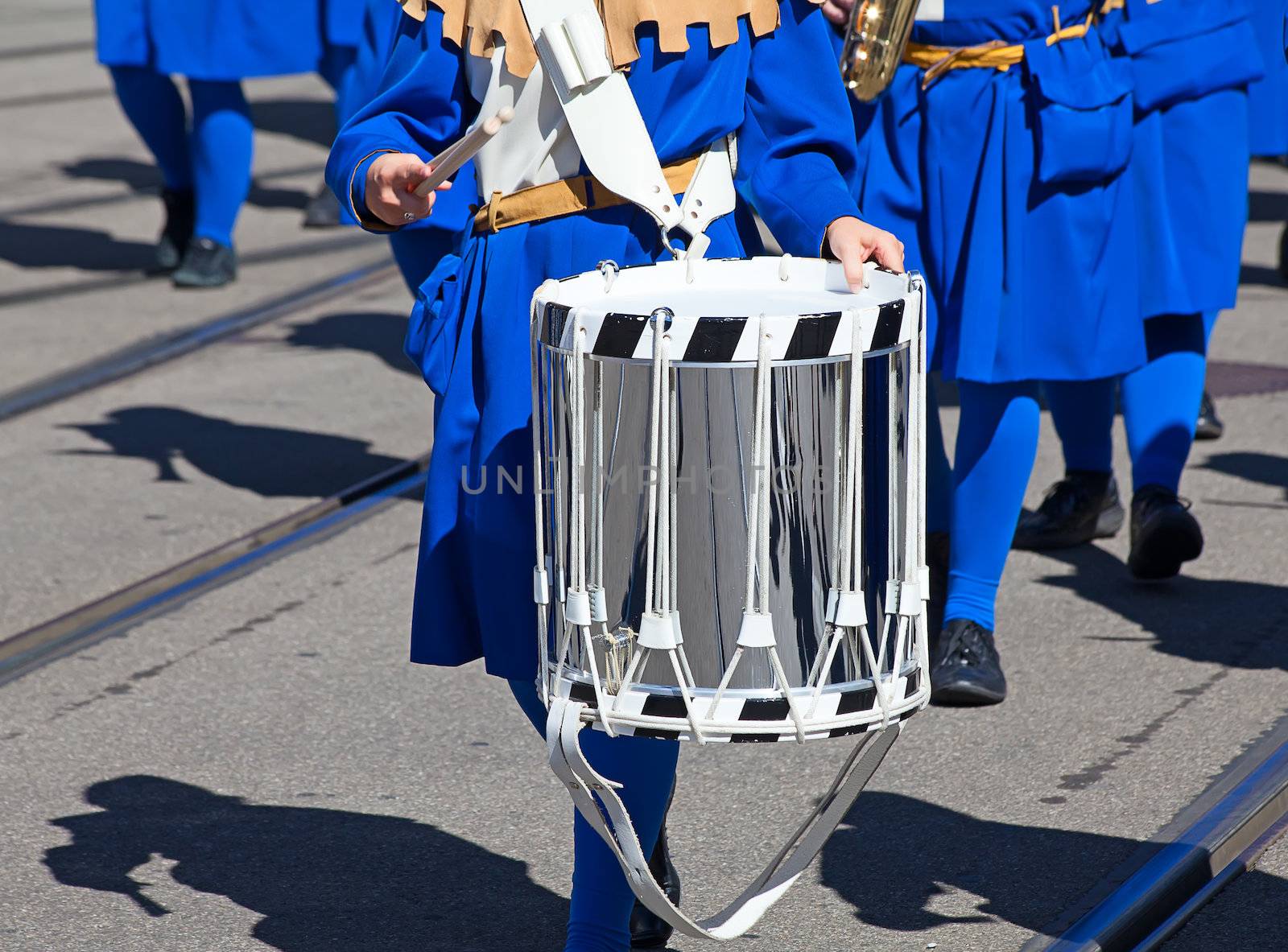 Drum in the hands of the musician on the street parade