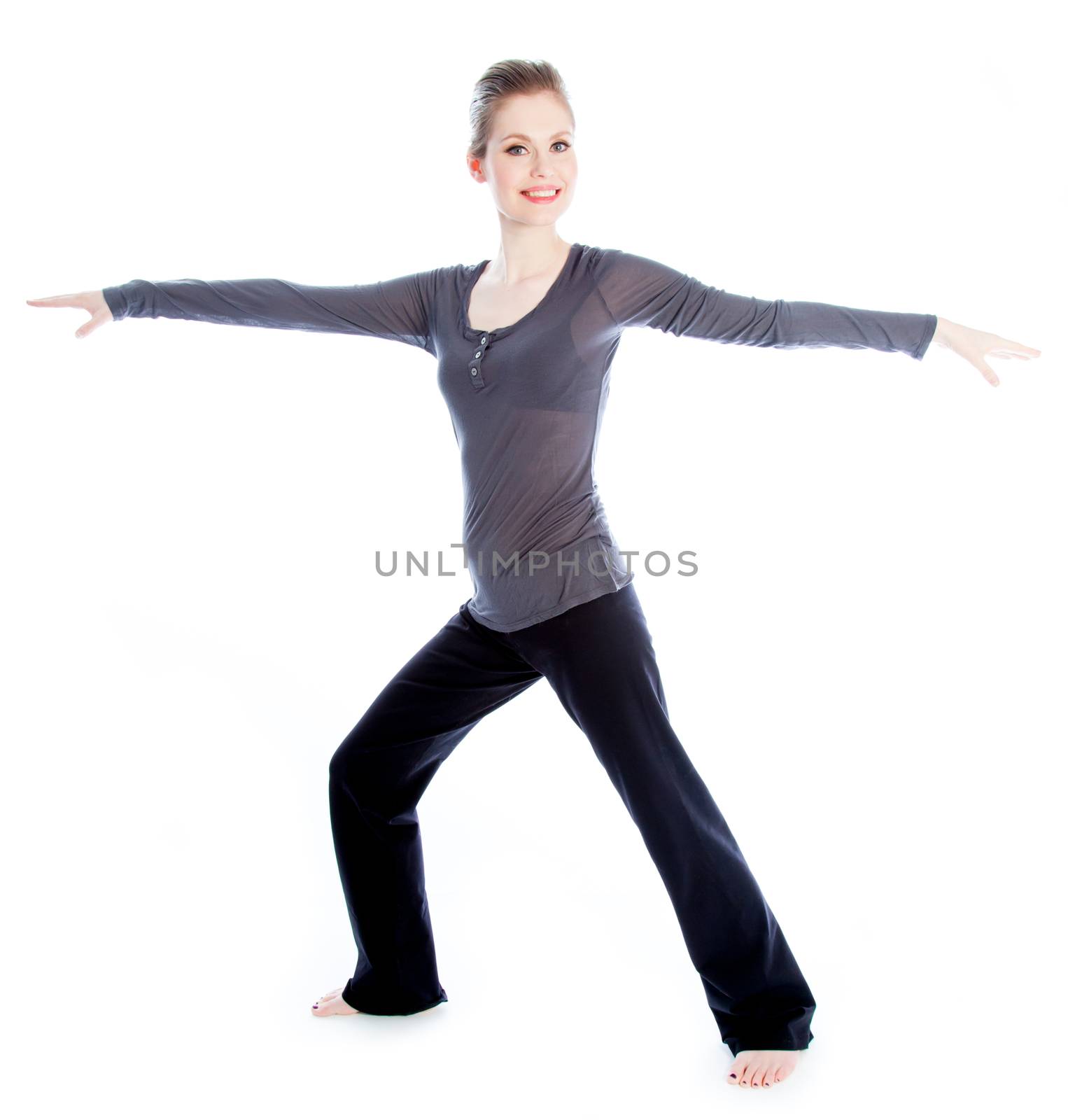 Attractive caucasian woman wearing a sport outfit in her 30 isolated on a white background