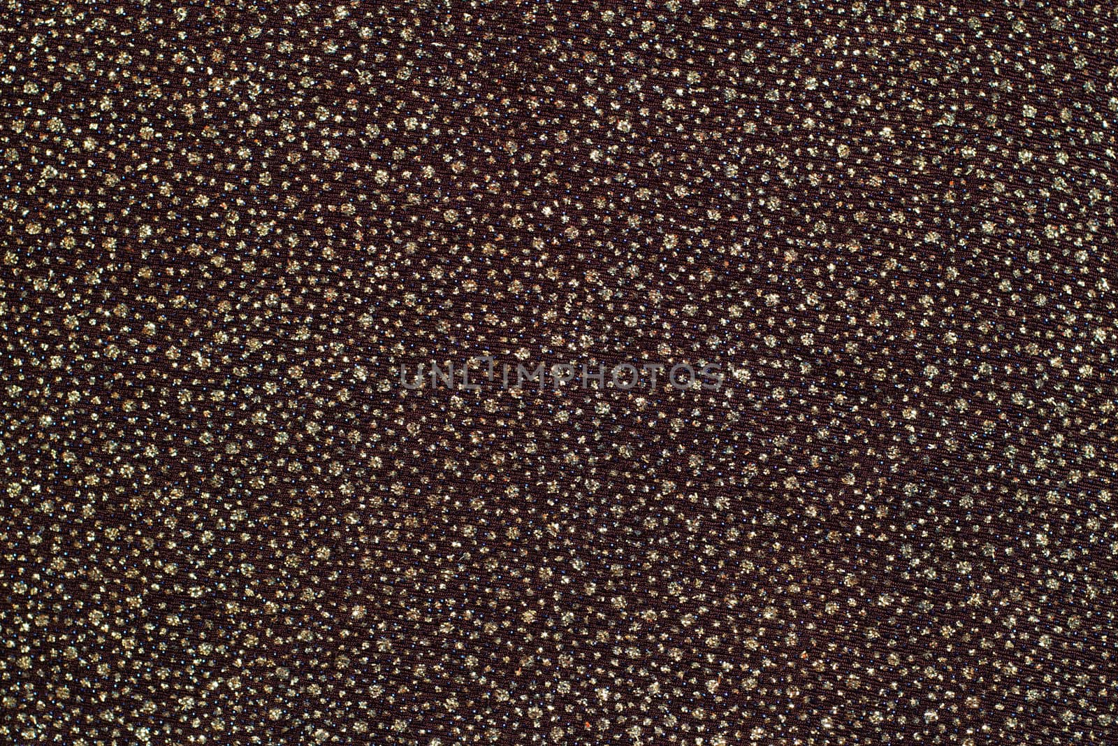 Texture of dark cloth with silver and blue sequins as background