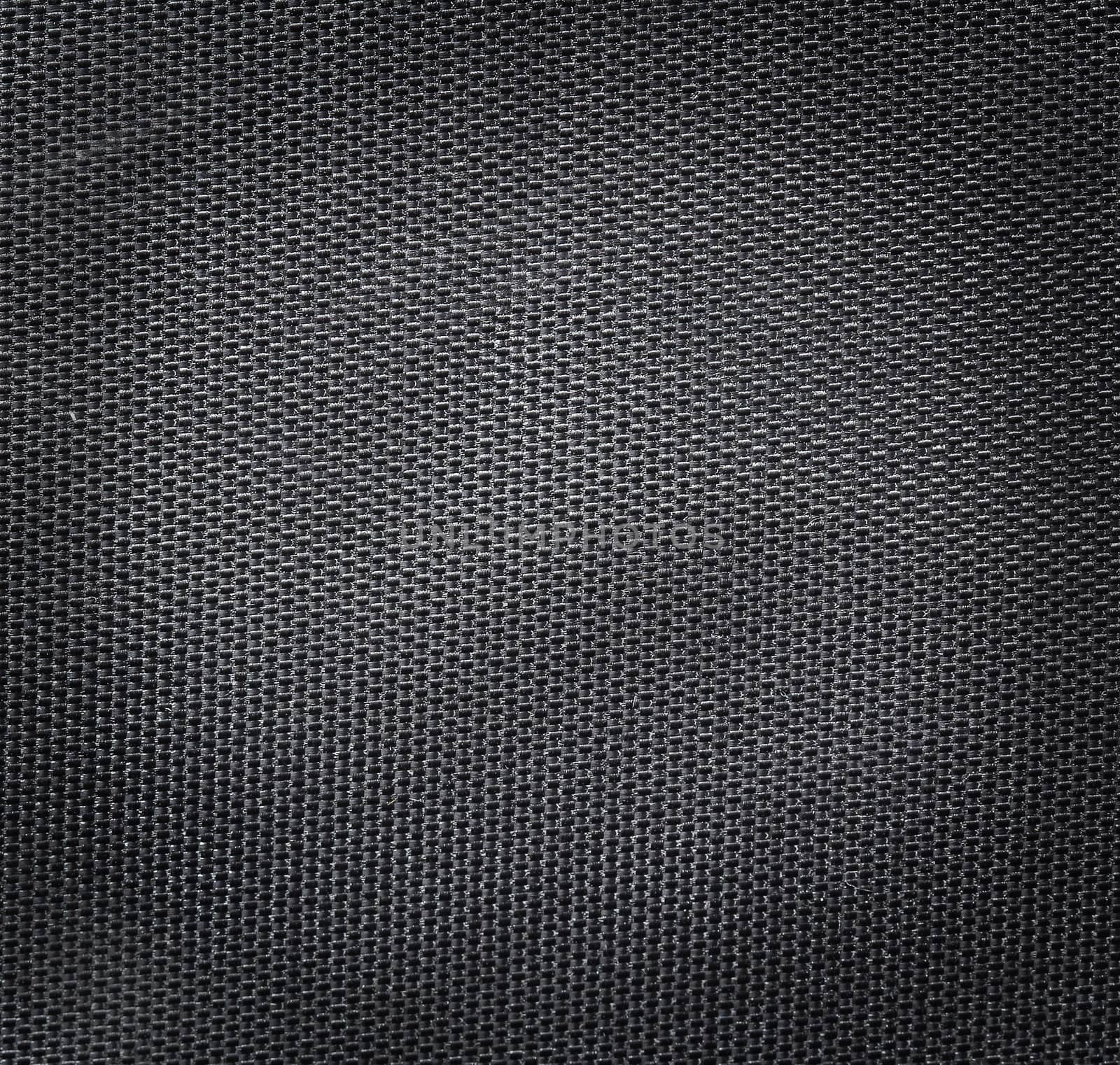 Black polyester texture background. Close up