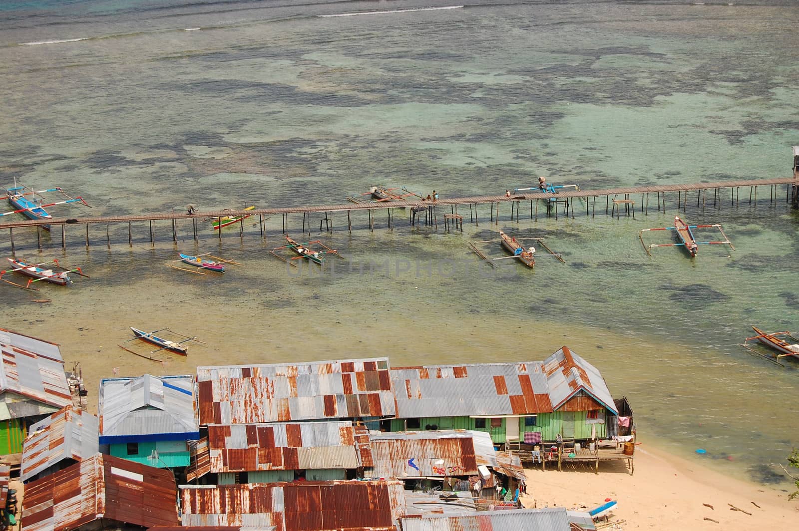 Fishing boats at village timber pier