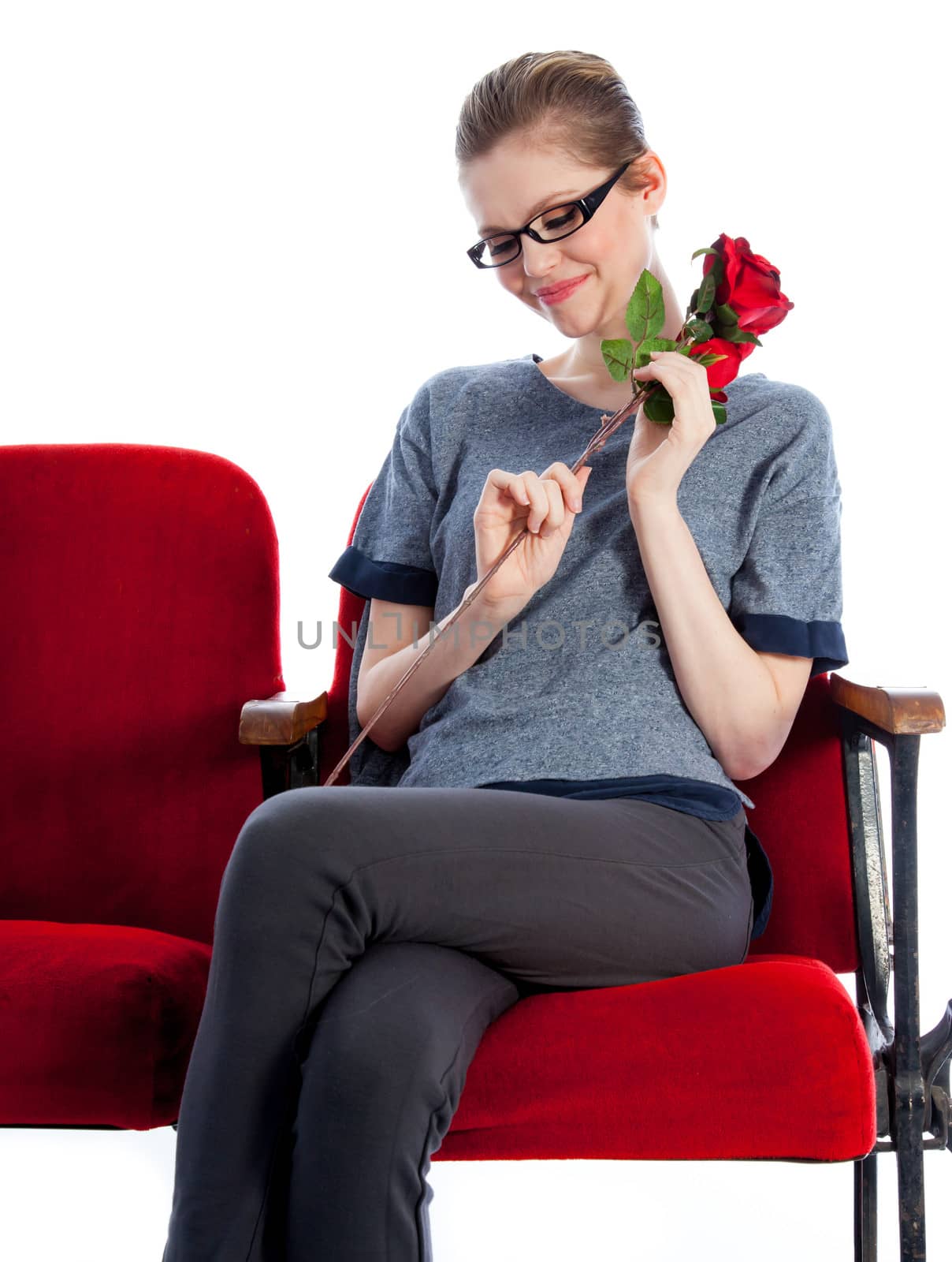 Attractive caucasian woman in the theatre in her 30 isolated on a white background