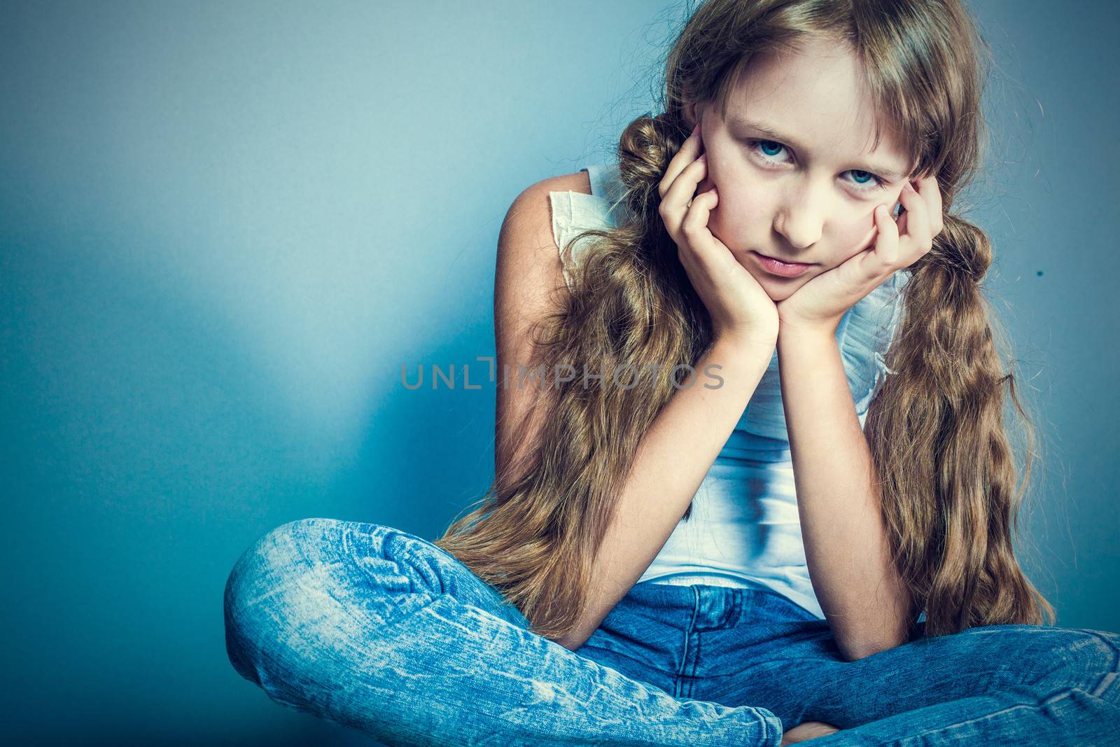 Image of young stylish grl looking at camera