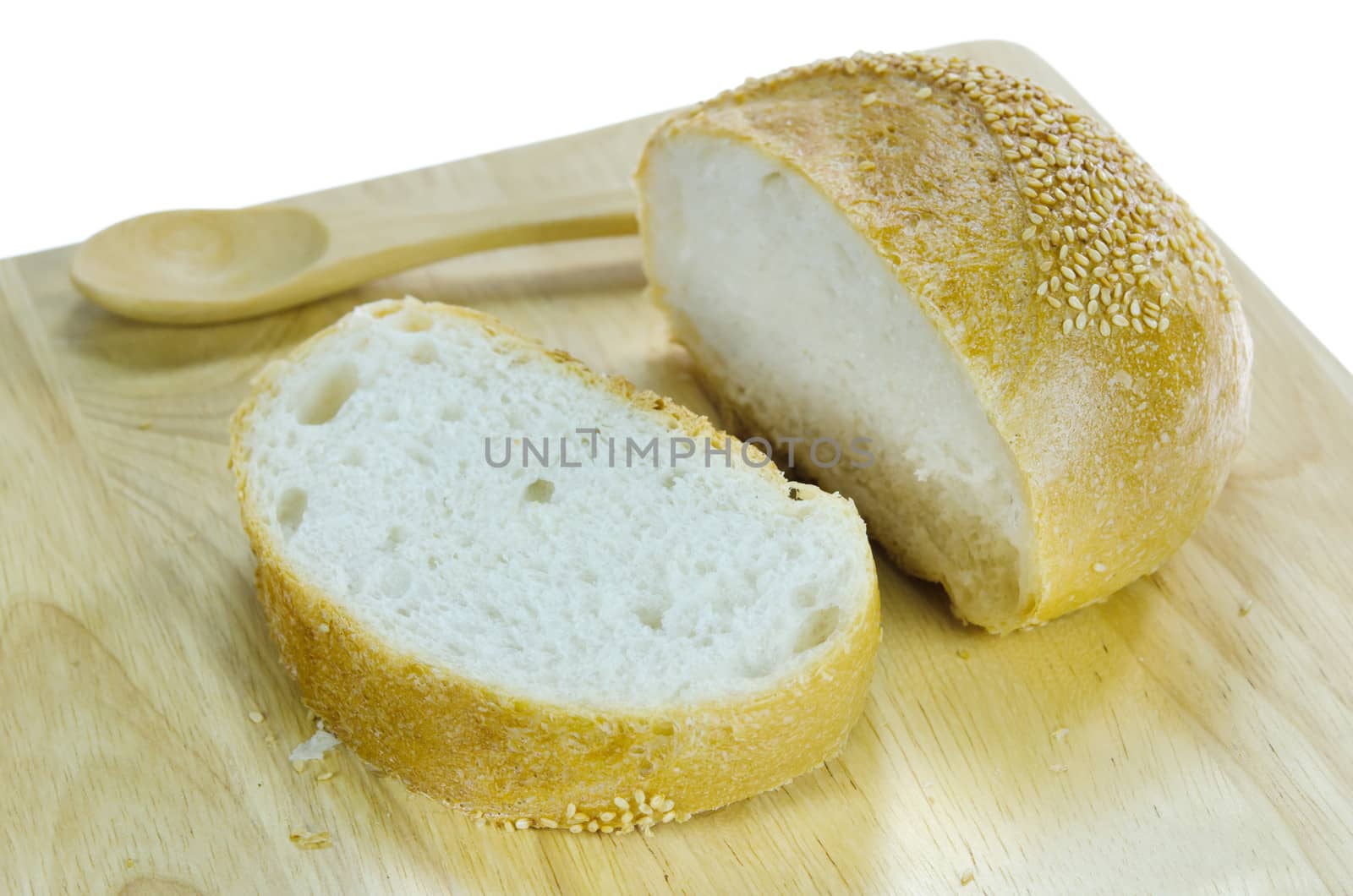 fresh rolls bread with sesame seeds on wooden board