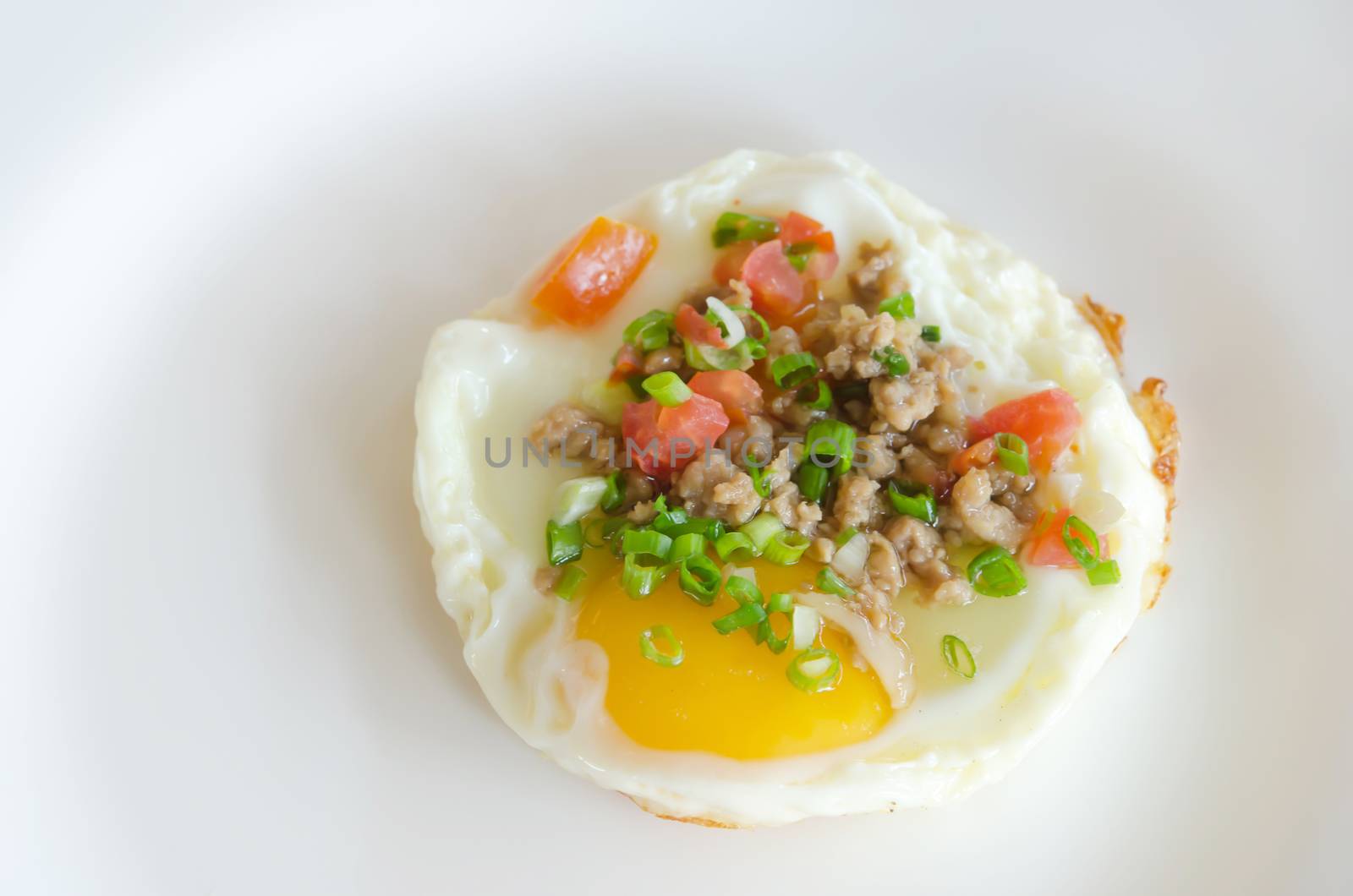 top view fried egg with minced pork and vegetable