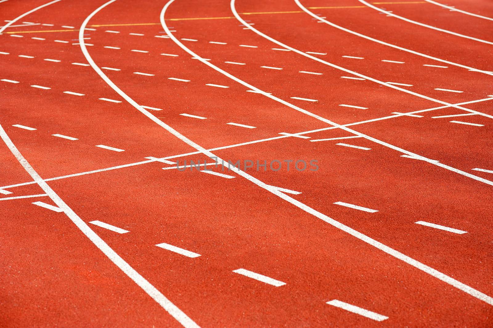 Red running track with curvy lanes