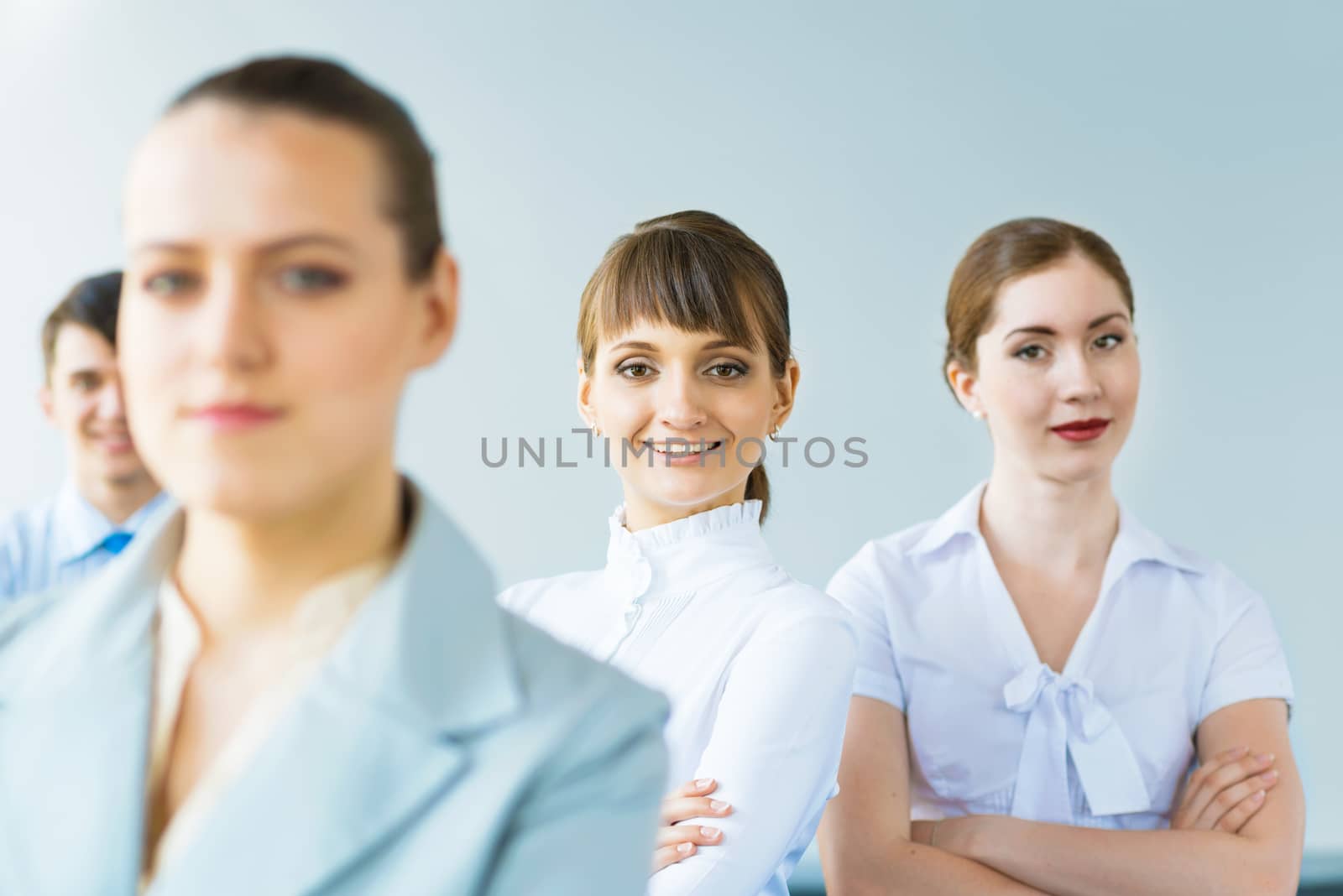 successful businessmen, a portrait of a business woman standing next to colleagues