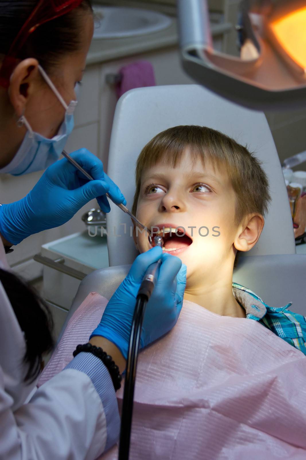 boy in a dental surgery by victosha