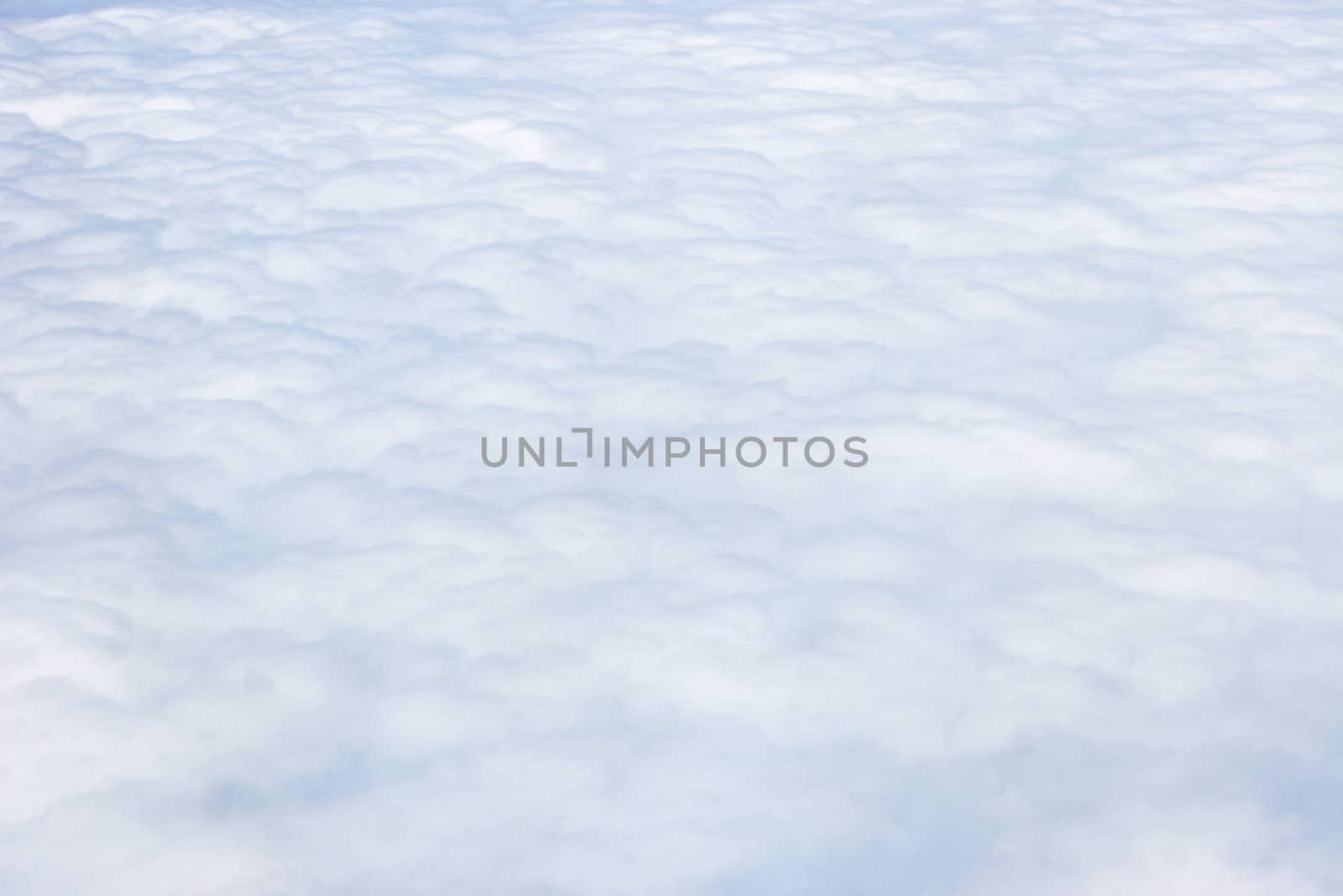 A view above white clouds