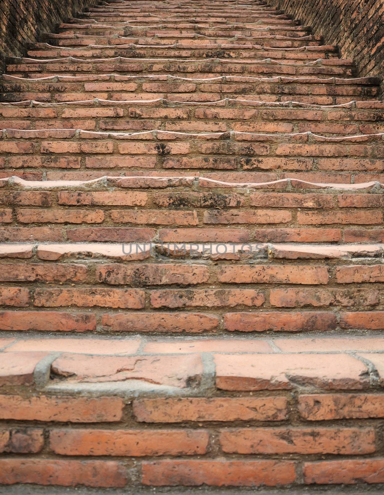  brick steps leading upward  by siraanamwong