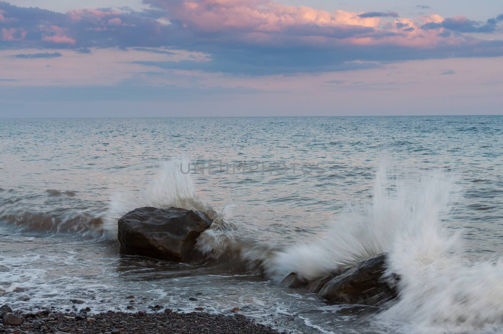 Waves breaking on coastal rocks. Black Sea, Crimea.
