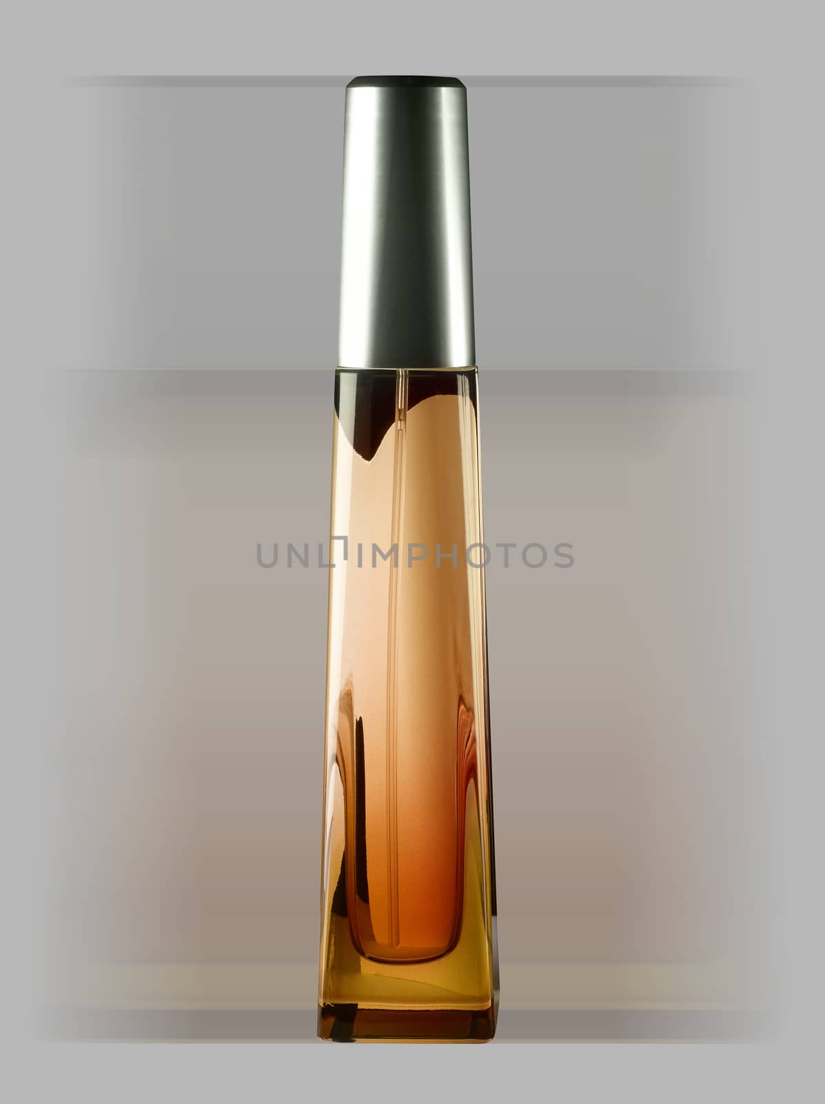 Tall bottle of parfume pale background. Isolated with path.