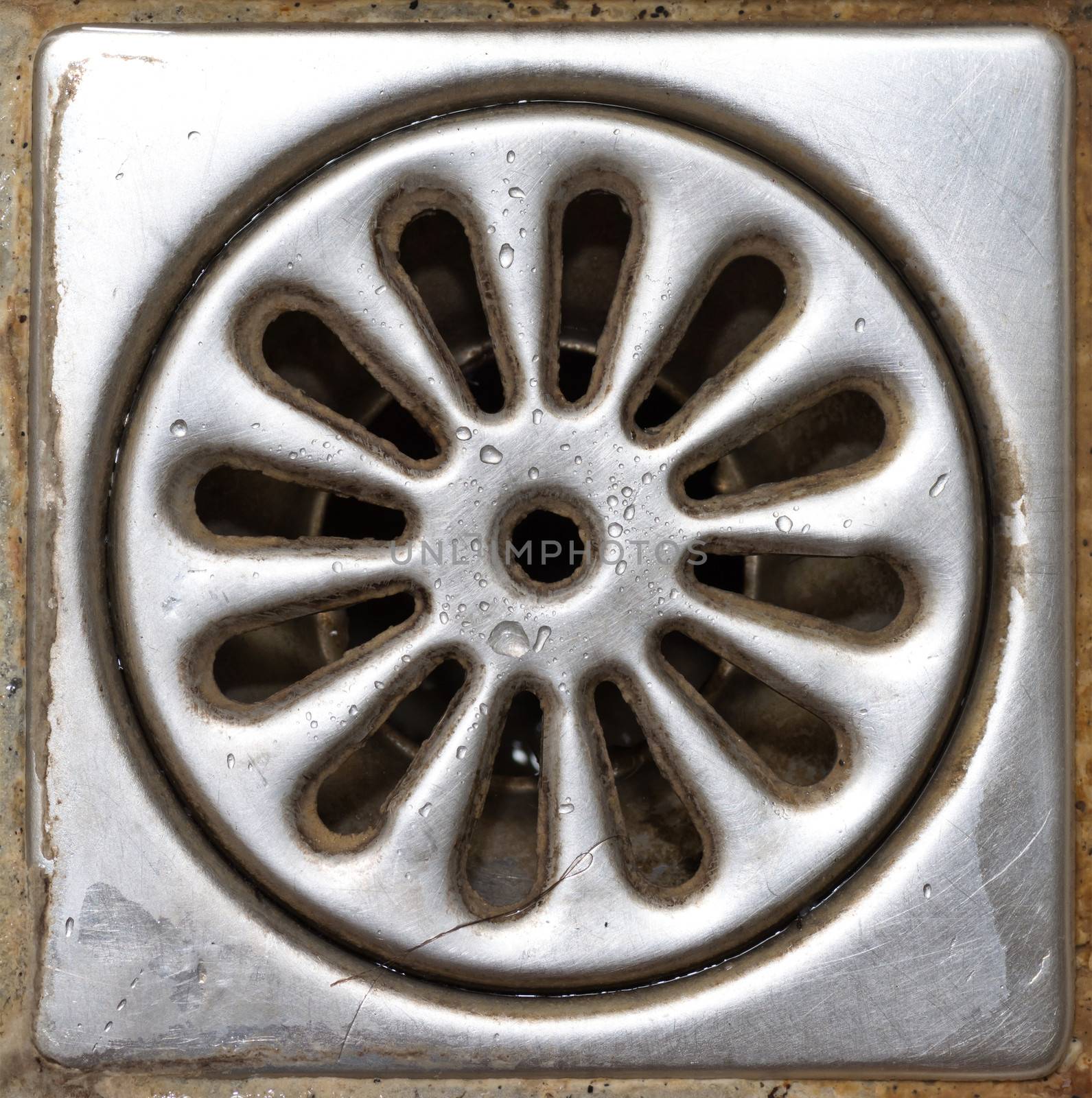 Old dirty shower drain close-up