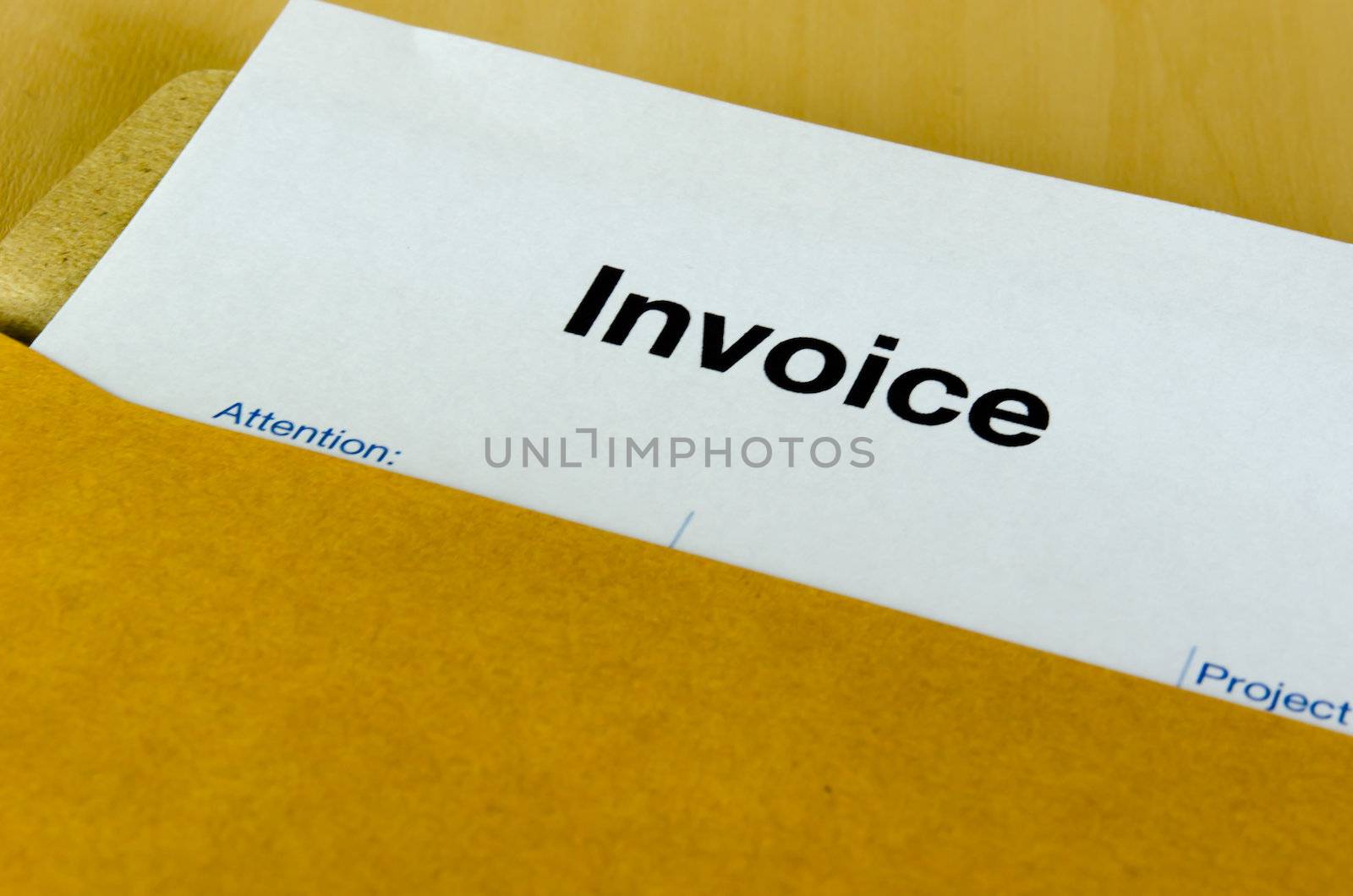 Billing invoice in the envelope on the table.