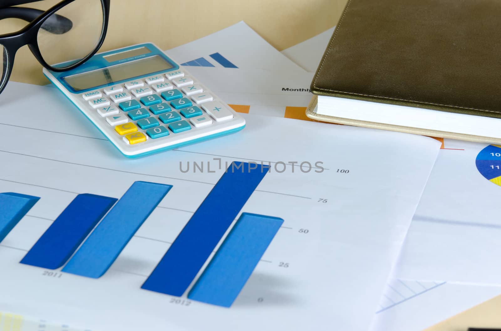 Business documents. Placed on the table with book