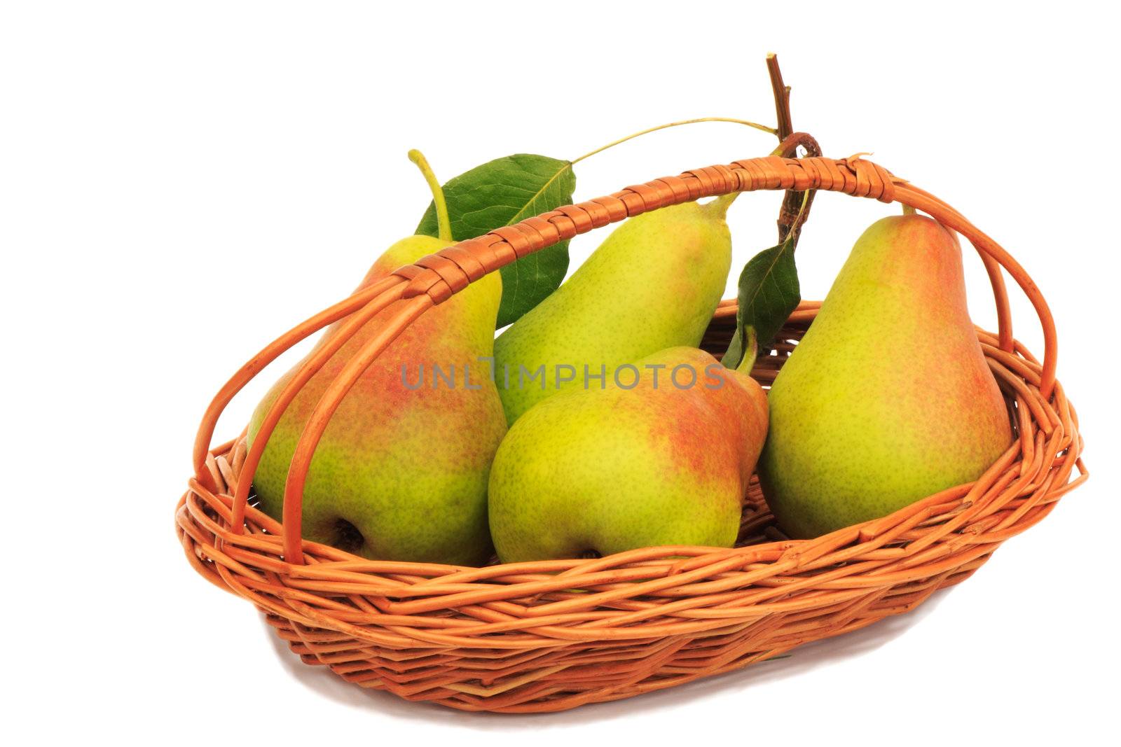 Large ripe pears in a wicker basket on a white background. by georgina198