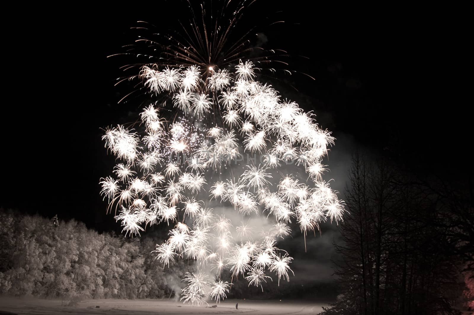 Fireworks over remote lake in Alaska on New Year's Day