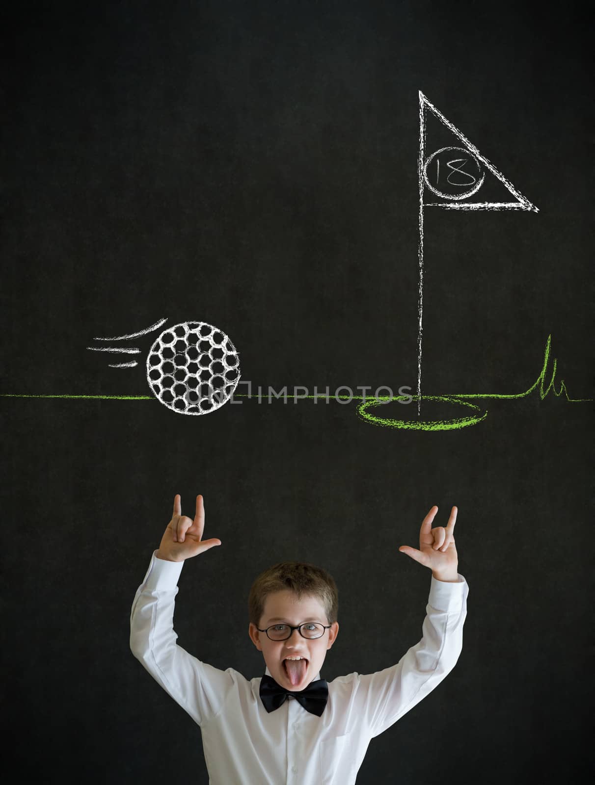 Knowledge rocks boy dressed up as business man with chalk golf ball flag green on blackboard background
