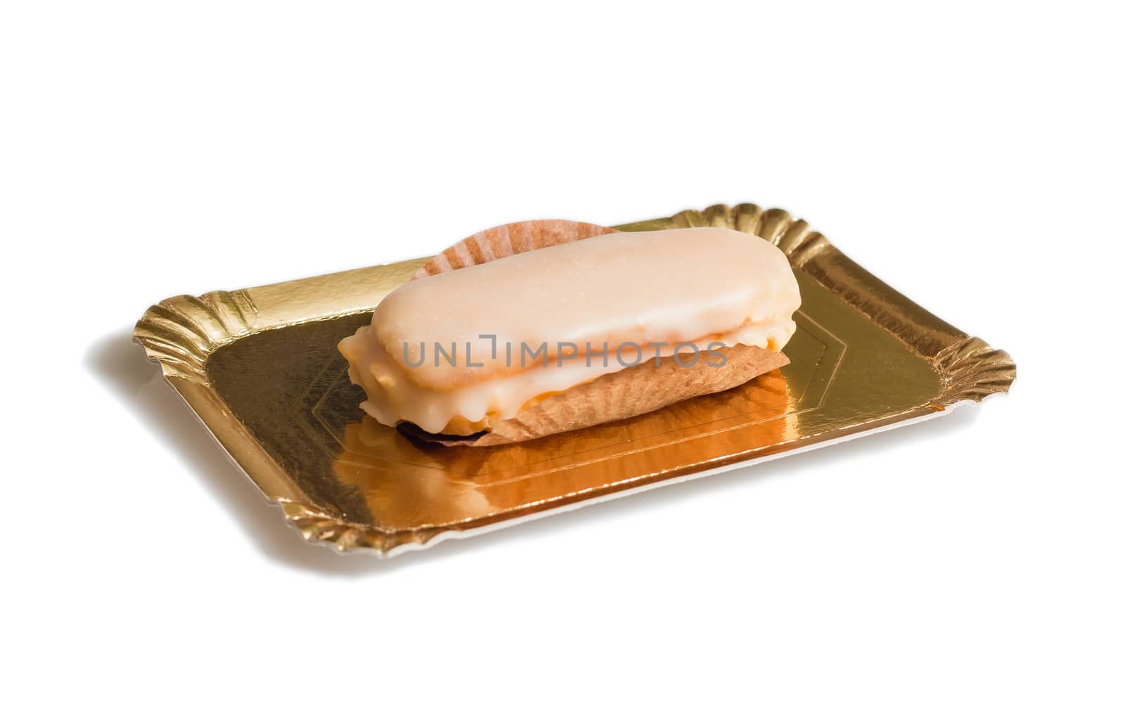 Delicious traditional asturian almond cake with sugar frosting and known as "carbayon", isolated on white background