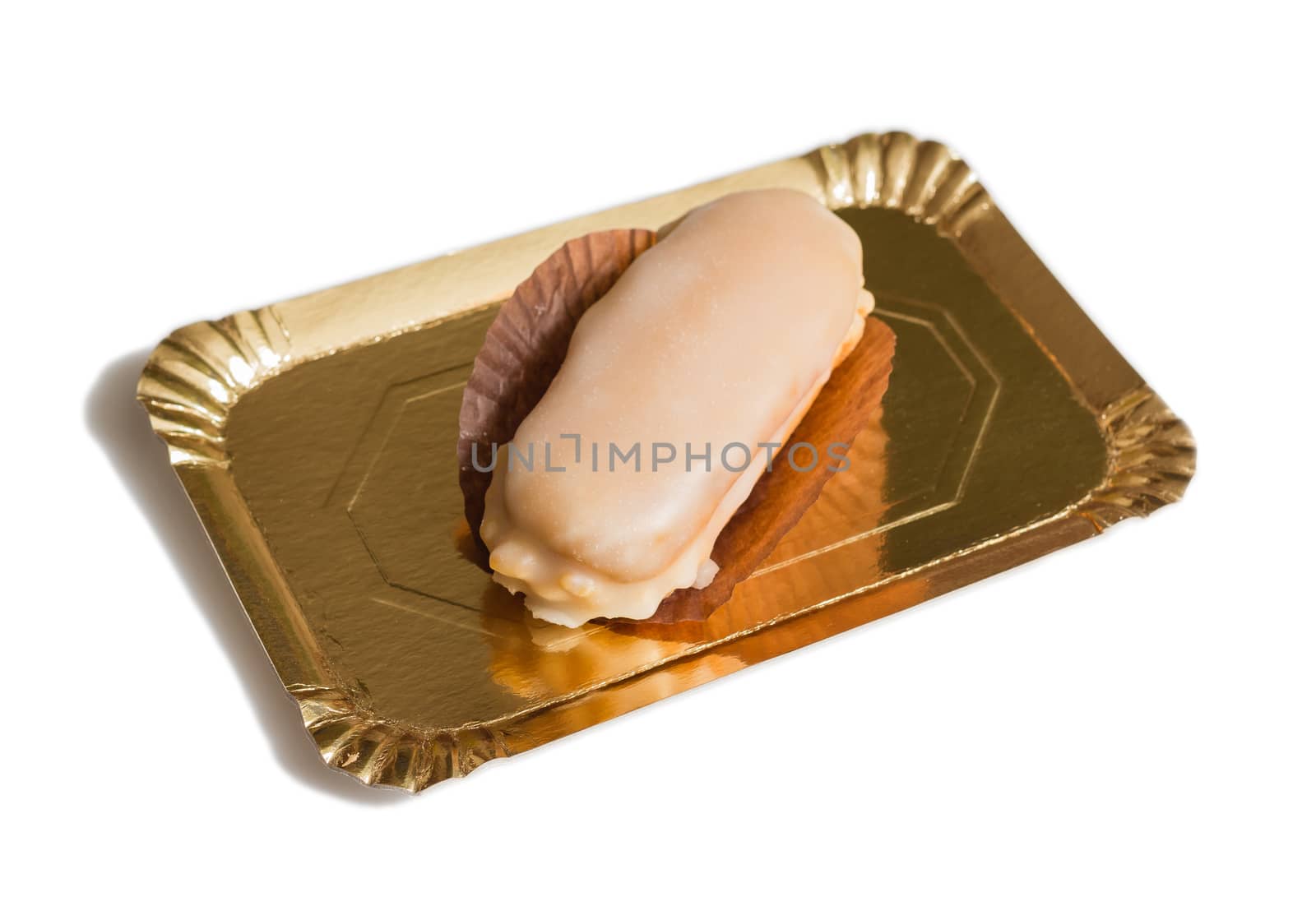 Delicious traditional asturian almond cake with sugar frosting and known as "carbayon", isolated on white background