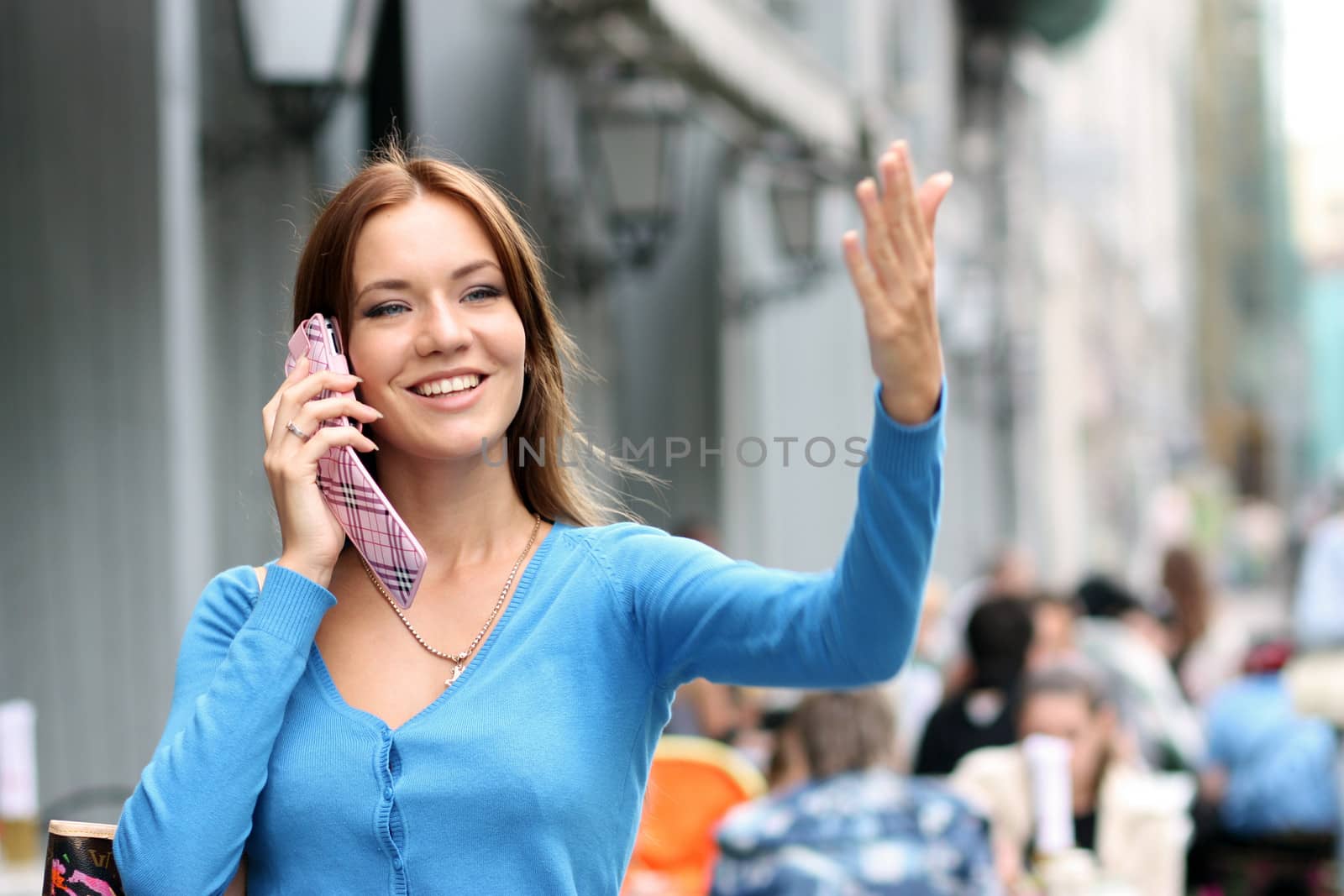 Young woman calling by phone