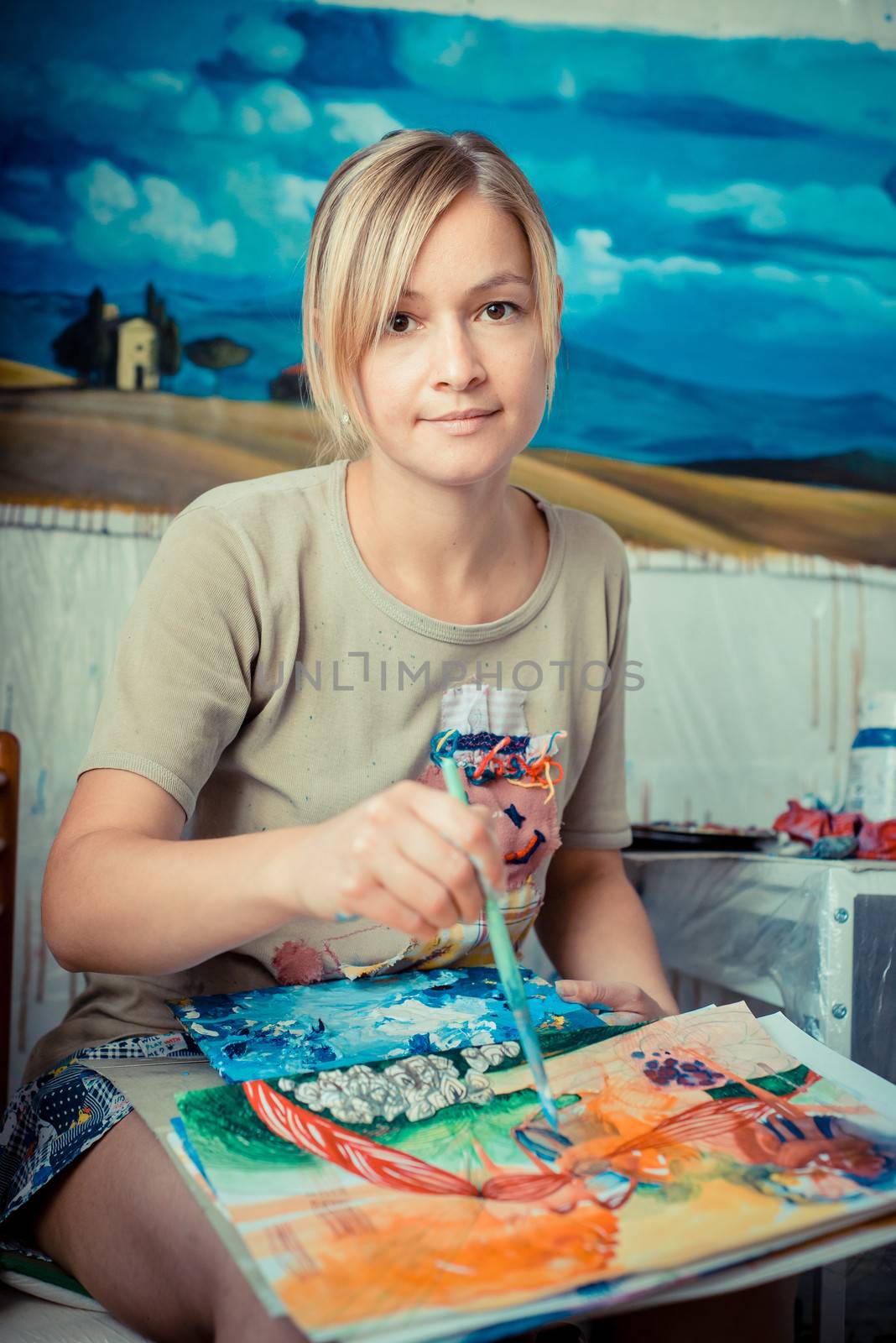 beautiful blonde woman painter by peus