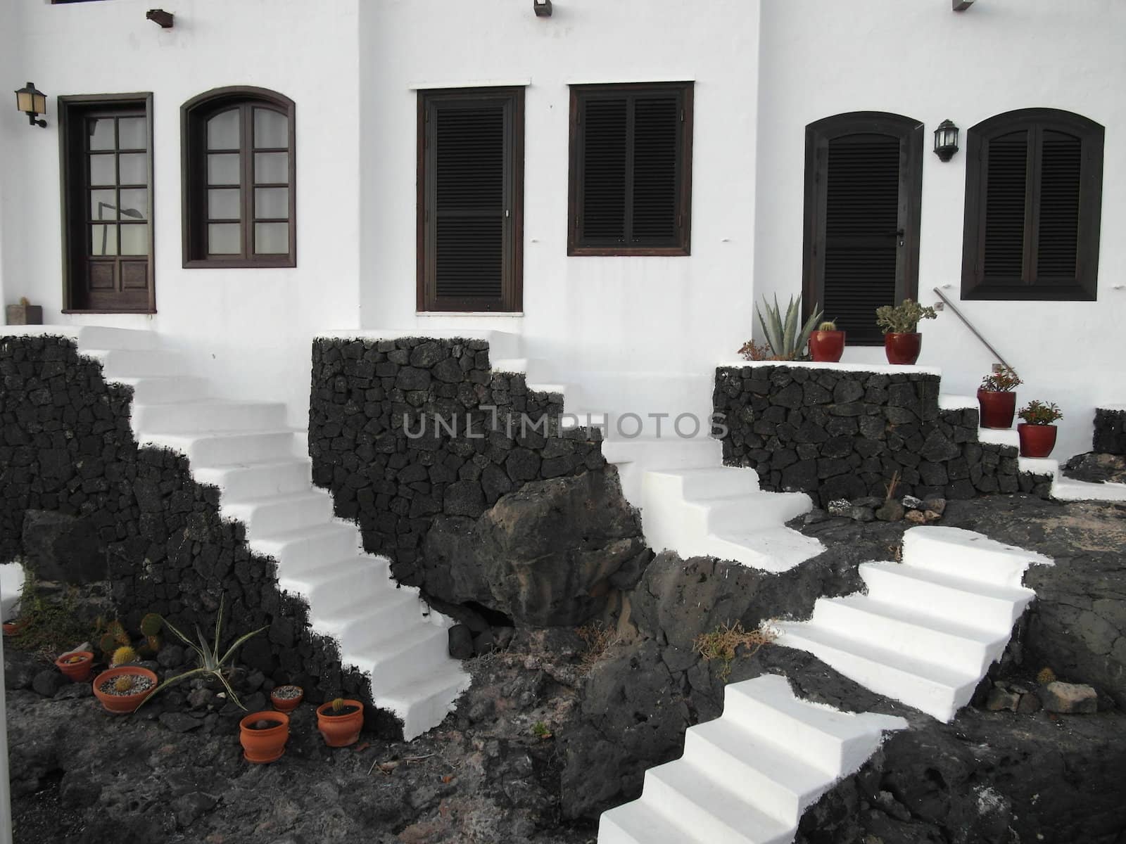 White stairs going down on the coast, in Canary Islands, Spain