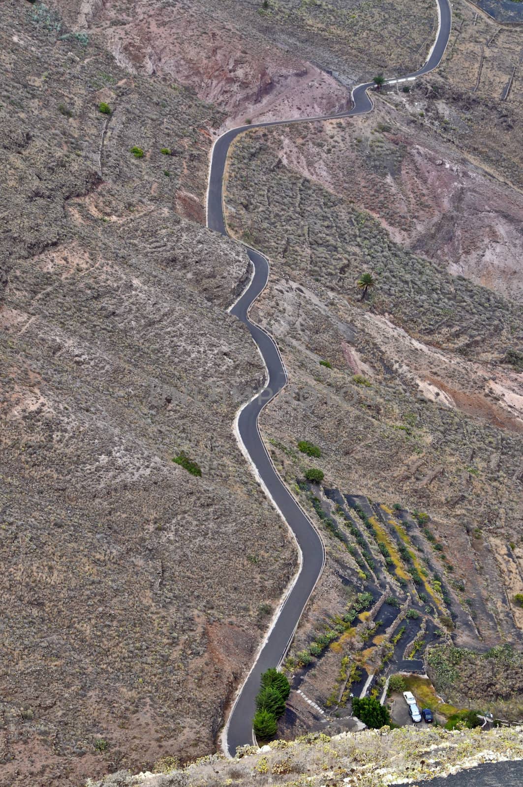 Road in the desrt from a mountain in Lanzarote Spain