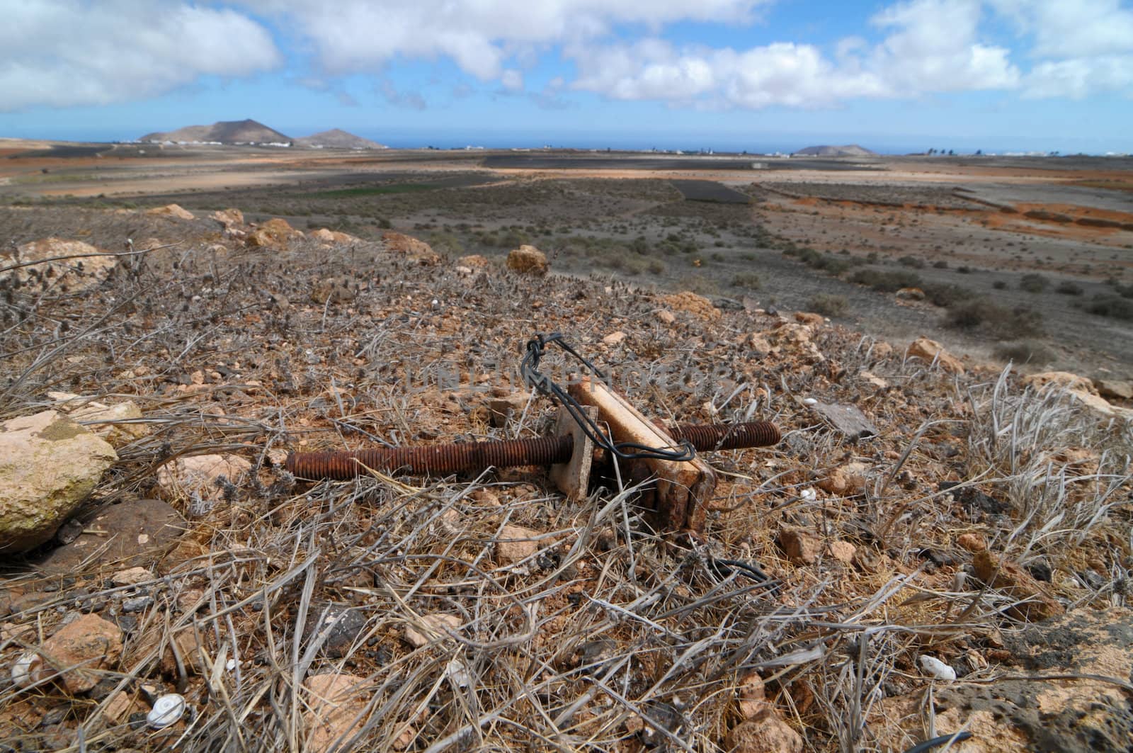 Old telephone pole part abandoned in the desert in Spain