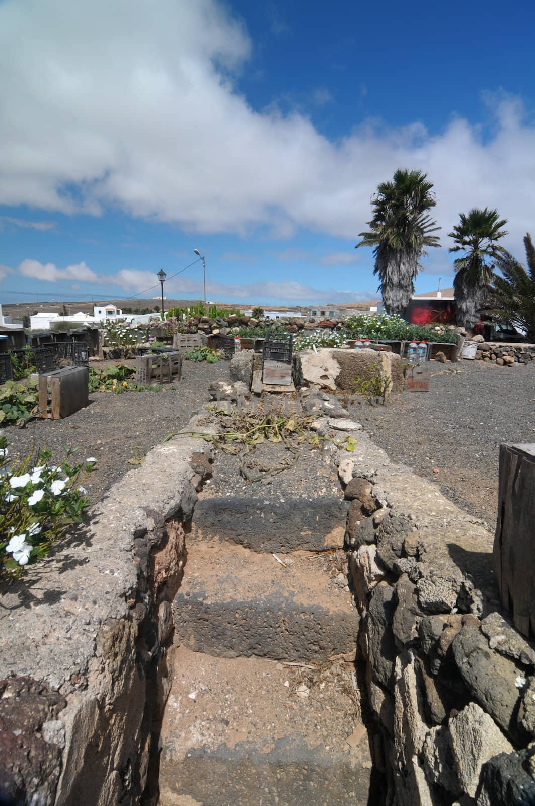 Rock stairs going down and cloudy sky ,in Lanzarote, Spain