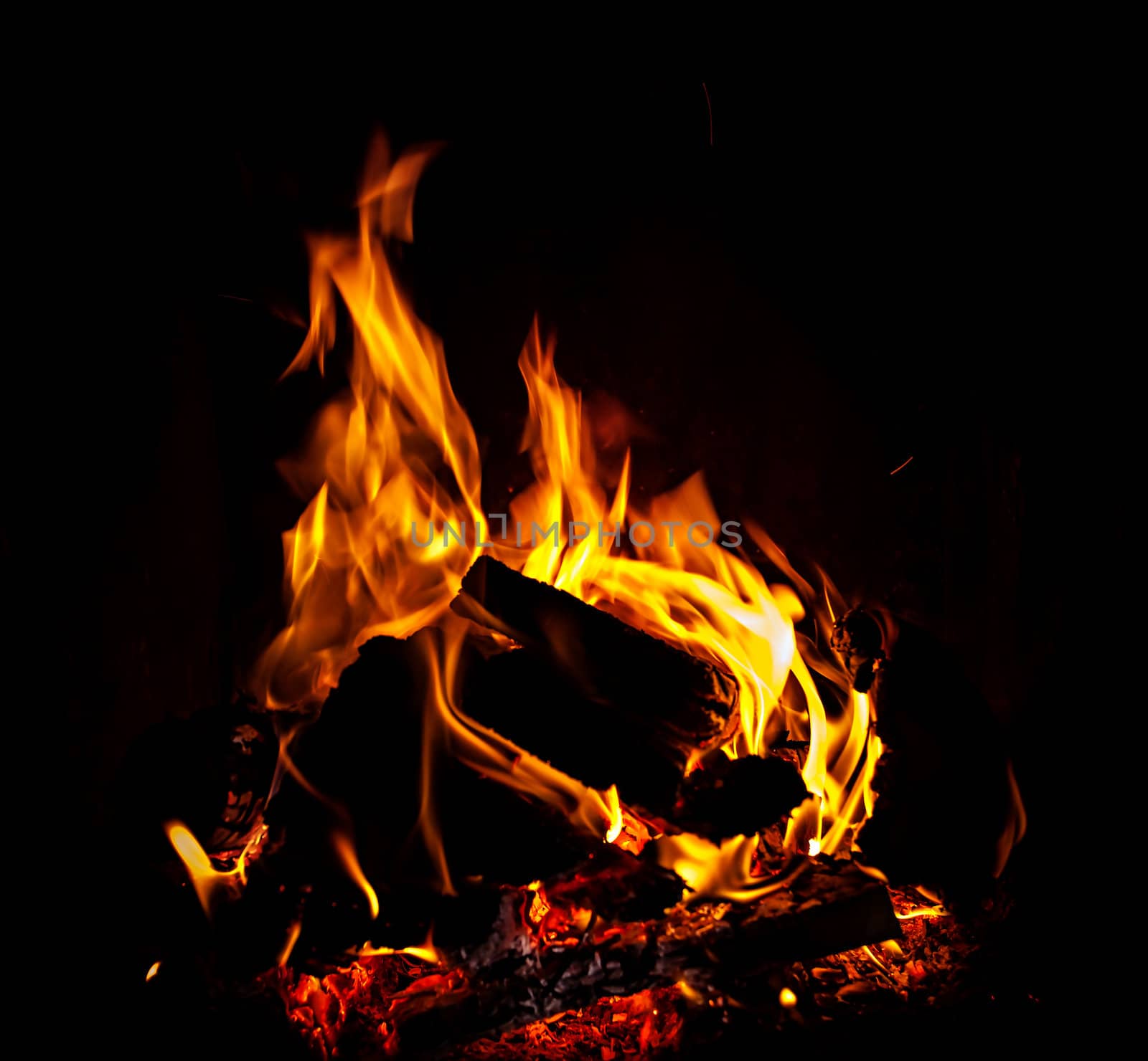 The fire in the furnace. Red flames on dark background