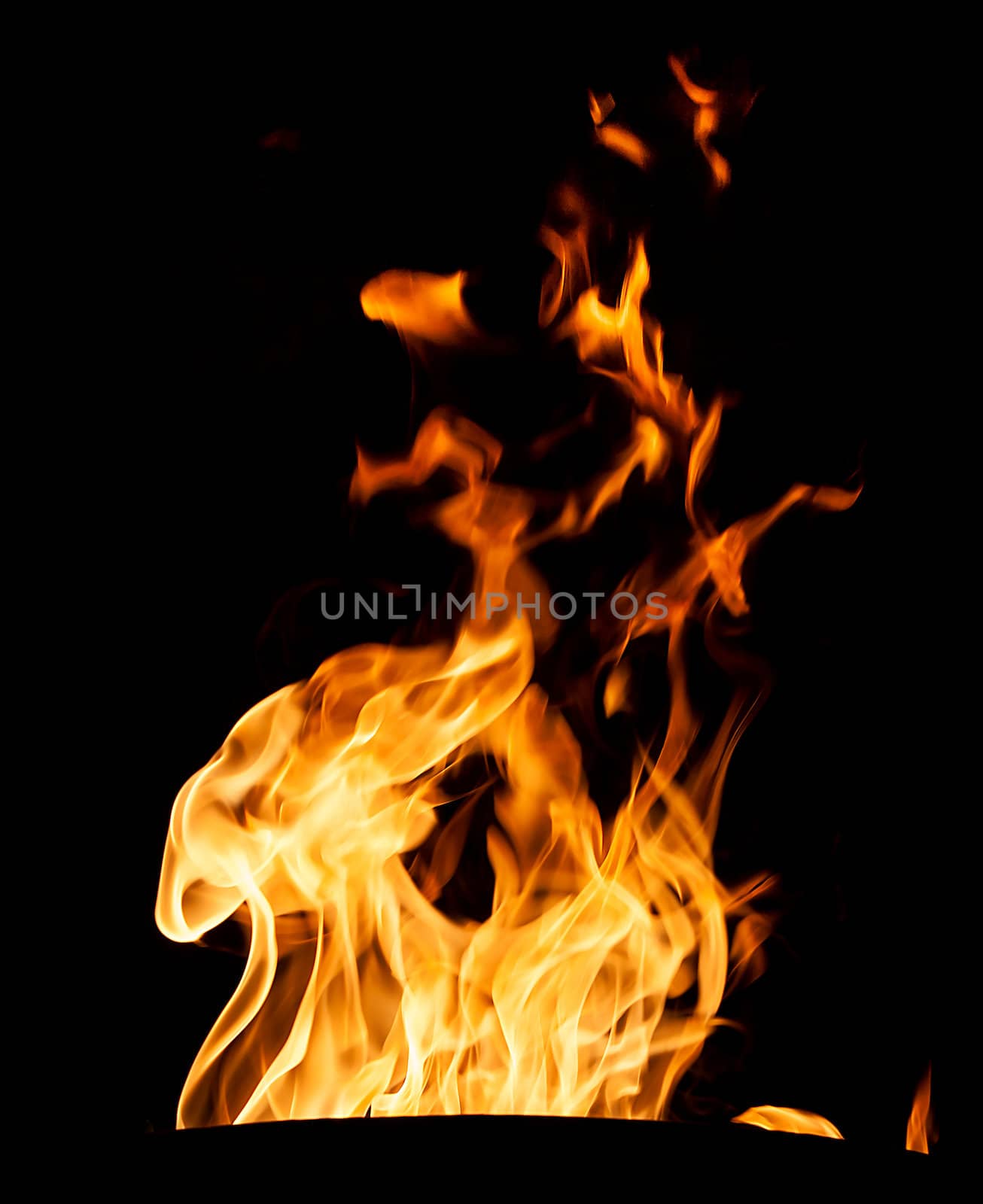 Orange fire flames on a black background