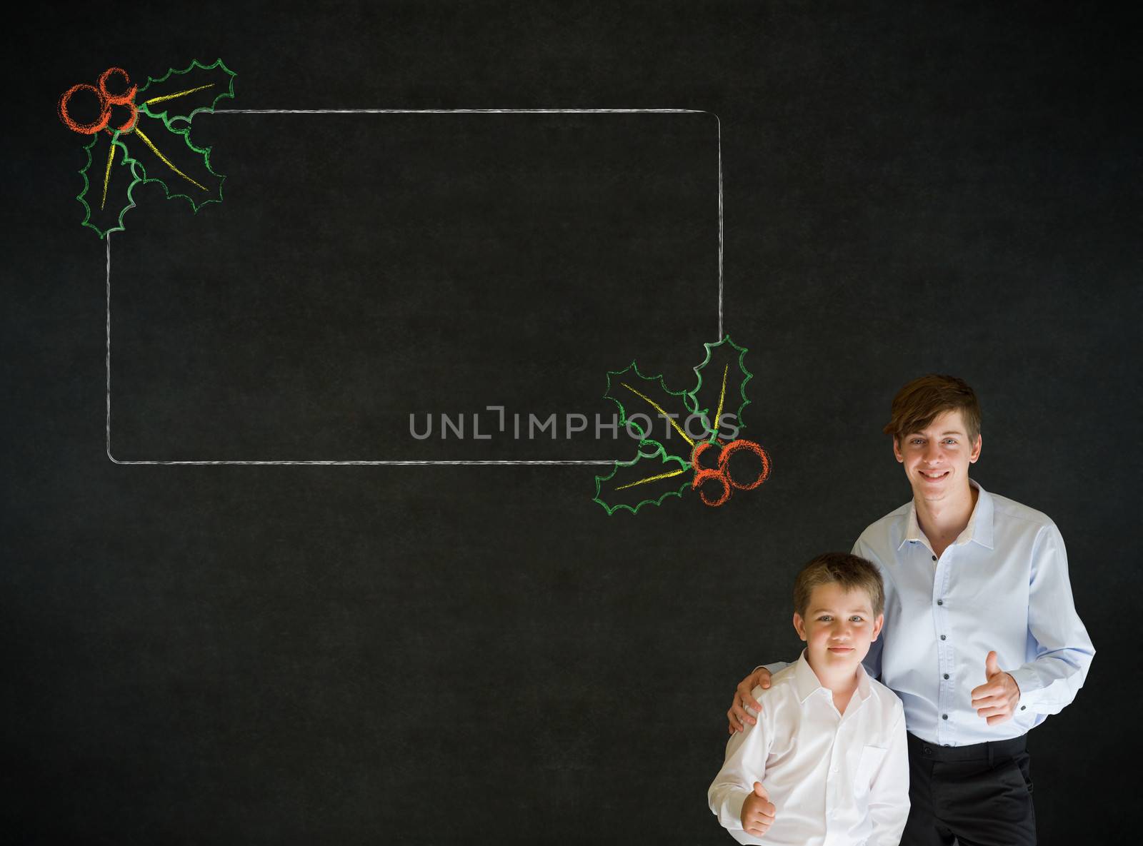 Thumbs up boy dressed up as business man with teacher man and Christmas holly to do checklist on blackboard background