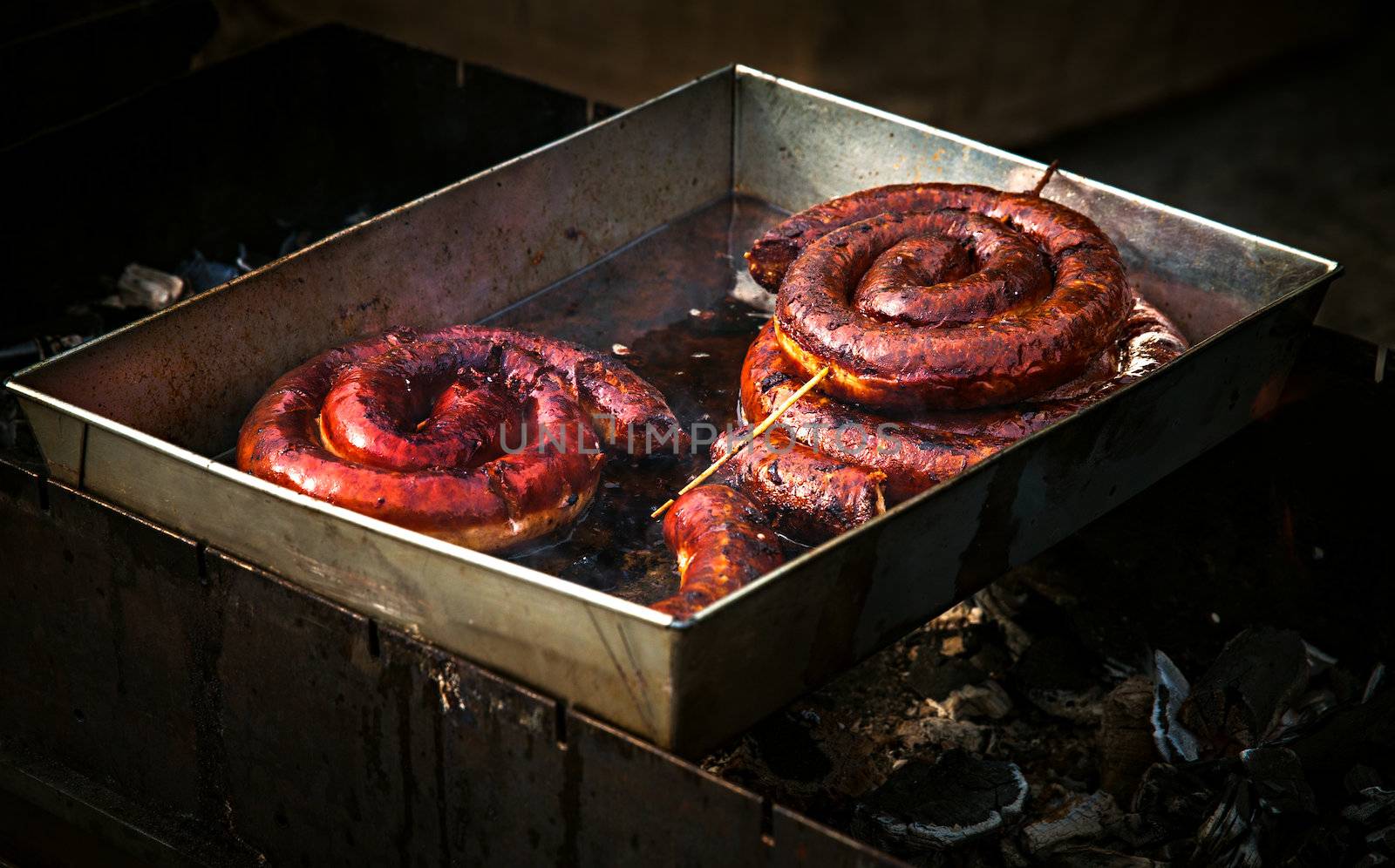 Appetizing and delicious pork sausage fried in oil