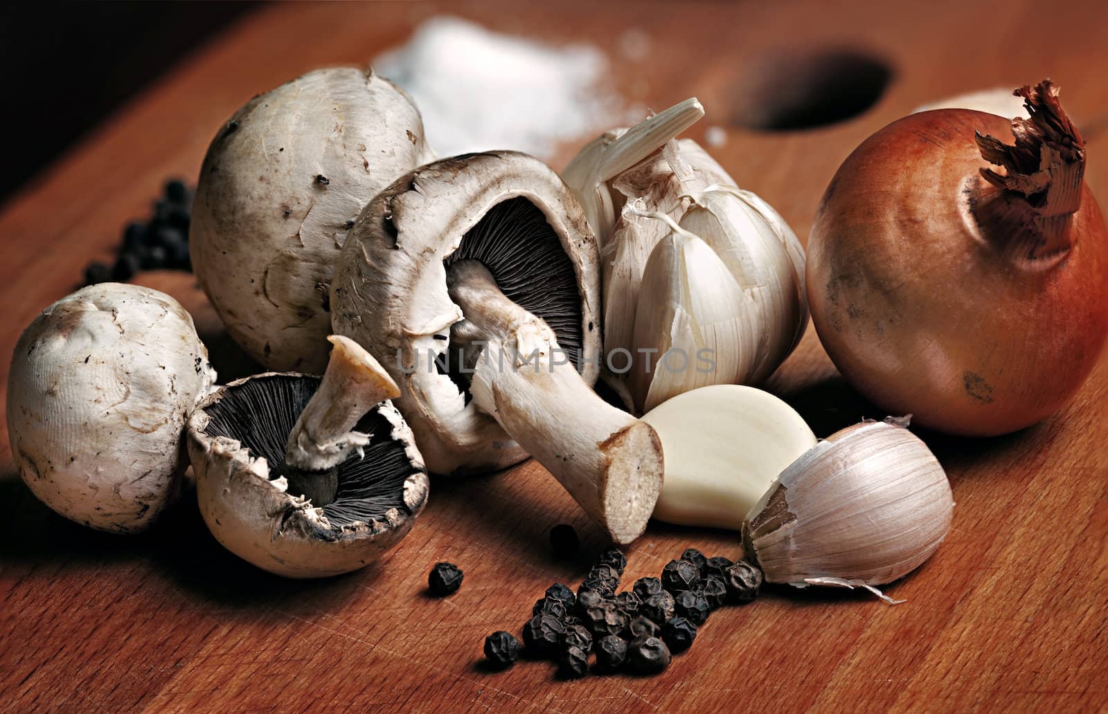 Still life with champignon mushrooms,  onion,  garlic and pepper