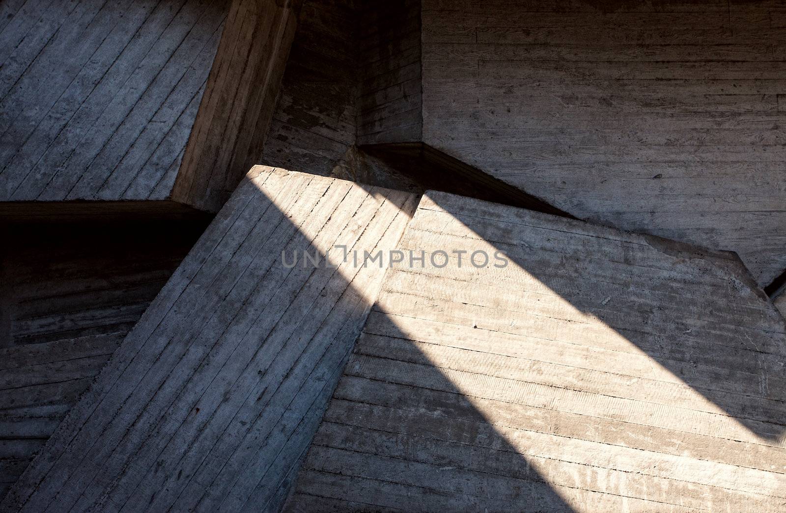 Abstract geometric concrete background  illuminated by sun