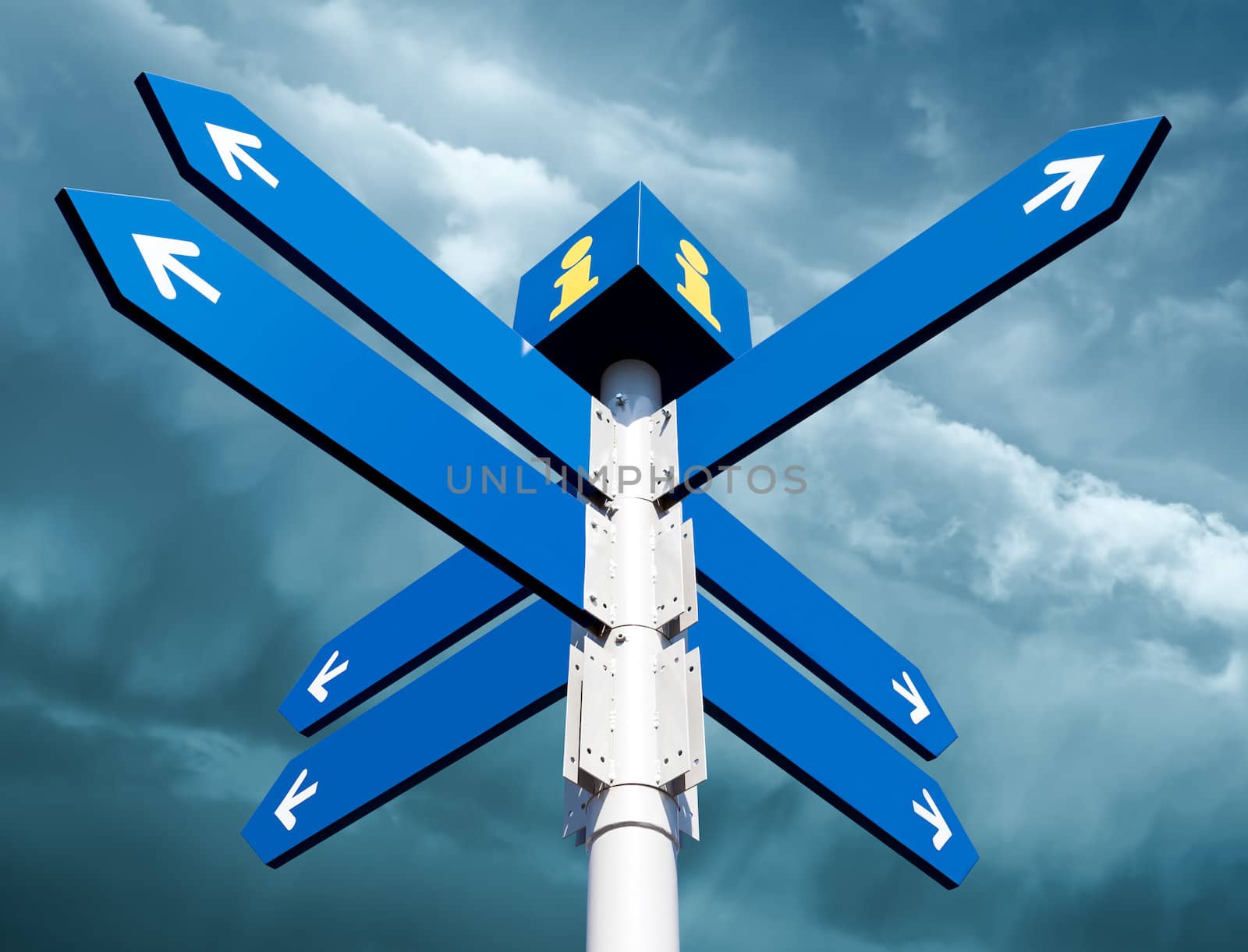 Blank directional road signs on sky background