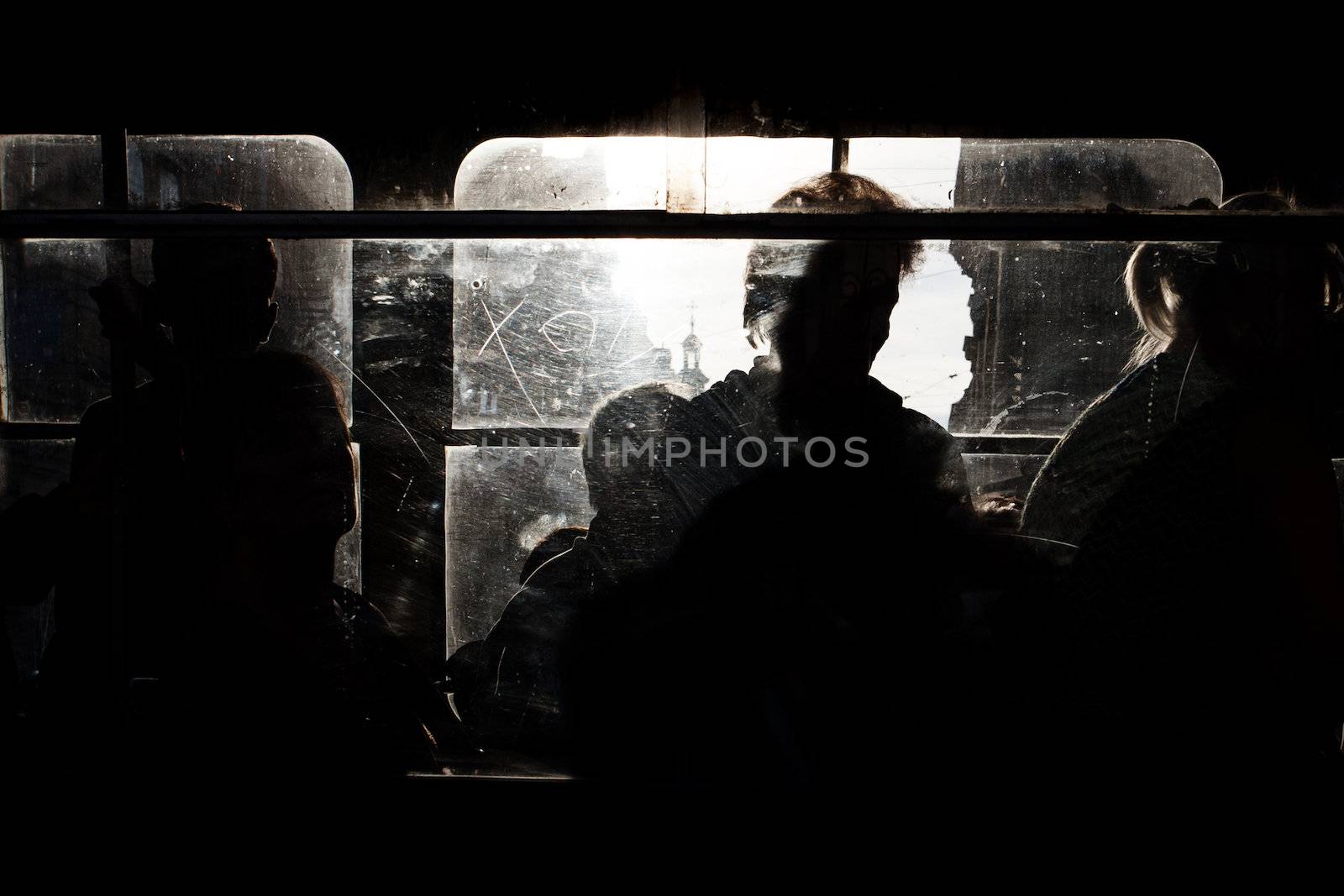 Bus carrying people in a city