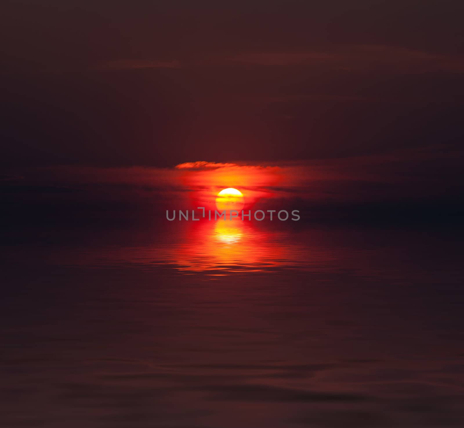 dramatic sunset and water reflection