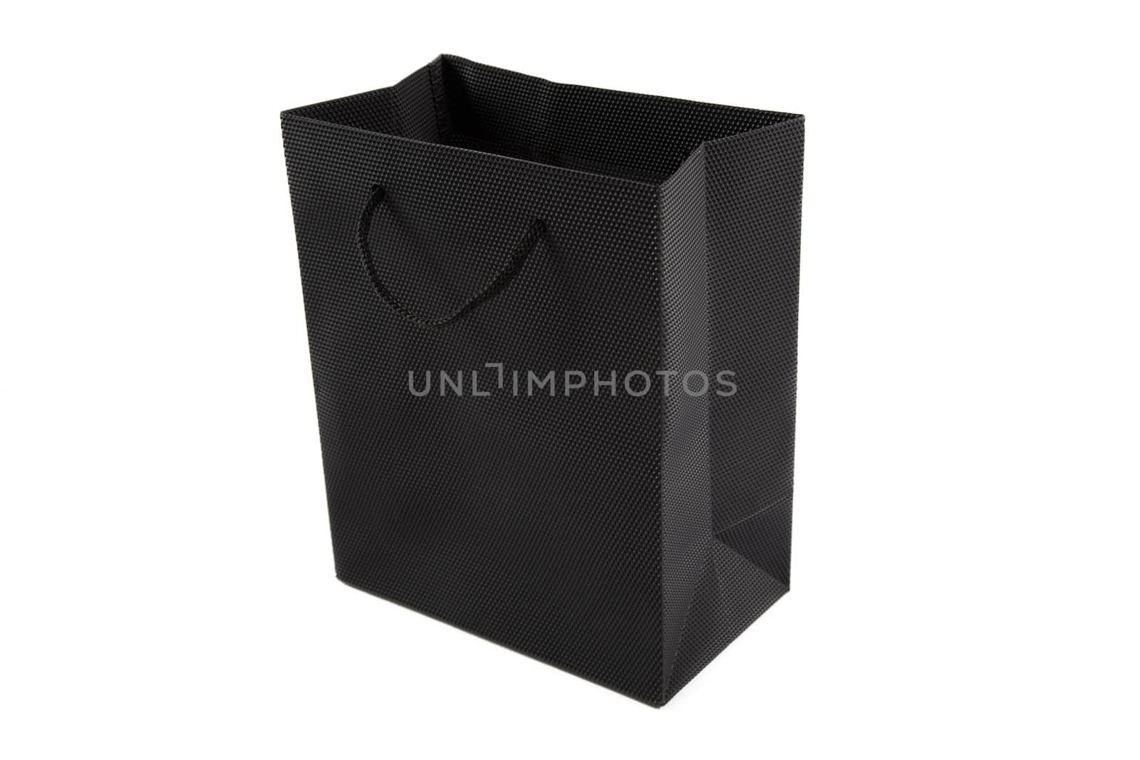 Black shopping bag with handles isolated on a white background